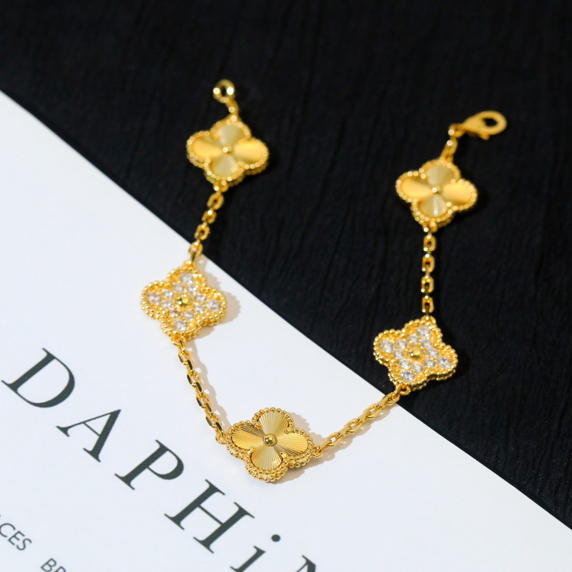 Van Cleef & Arpels classic engraved gold five-flower bracelet