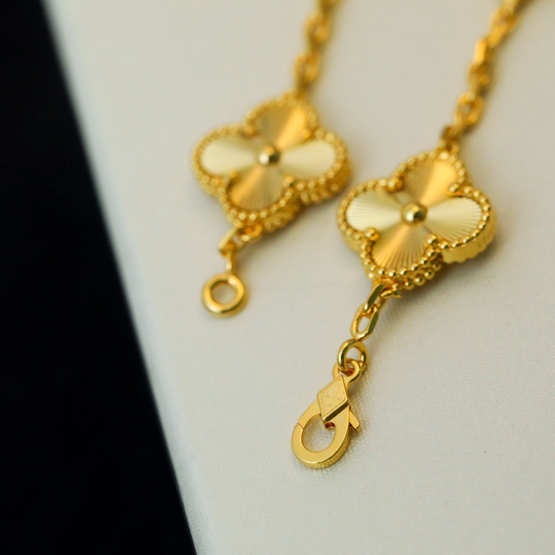 Van Cleef & Arpels classic engraved gold five-flower bracelet