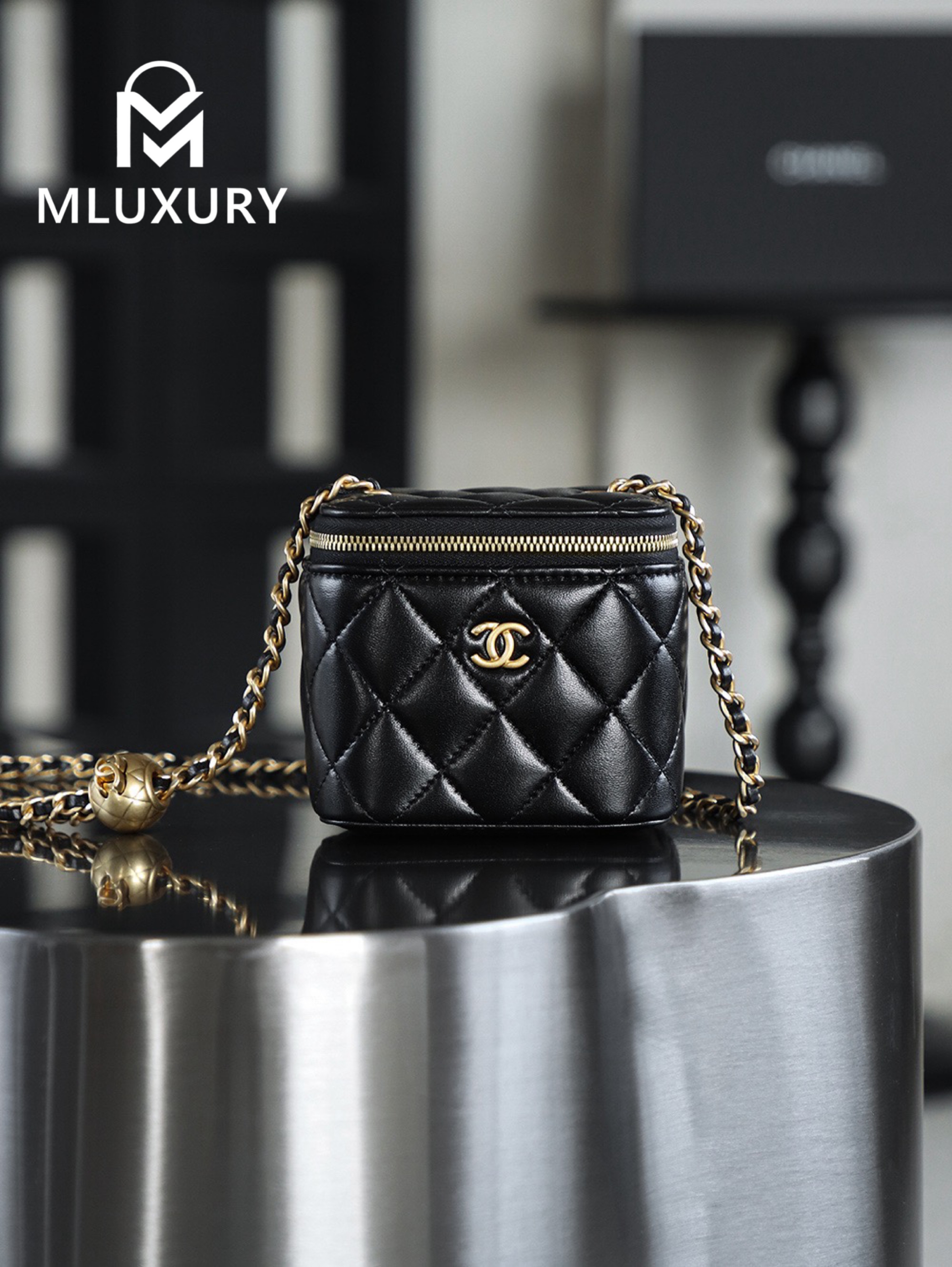 CHANEL Gold Globe Lipstick Bag