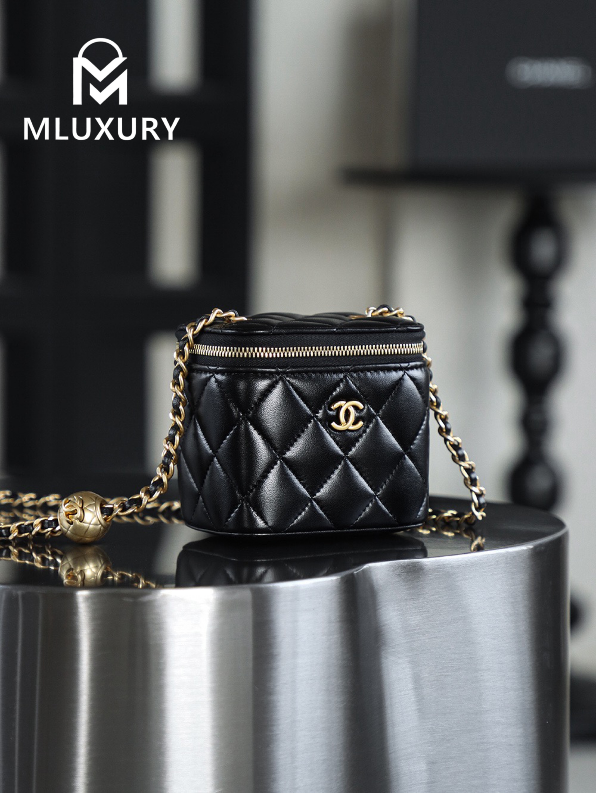 CHANEL Gold Globe Lipstick Bag