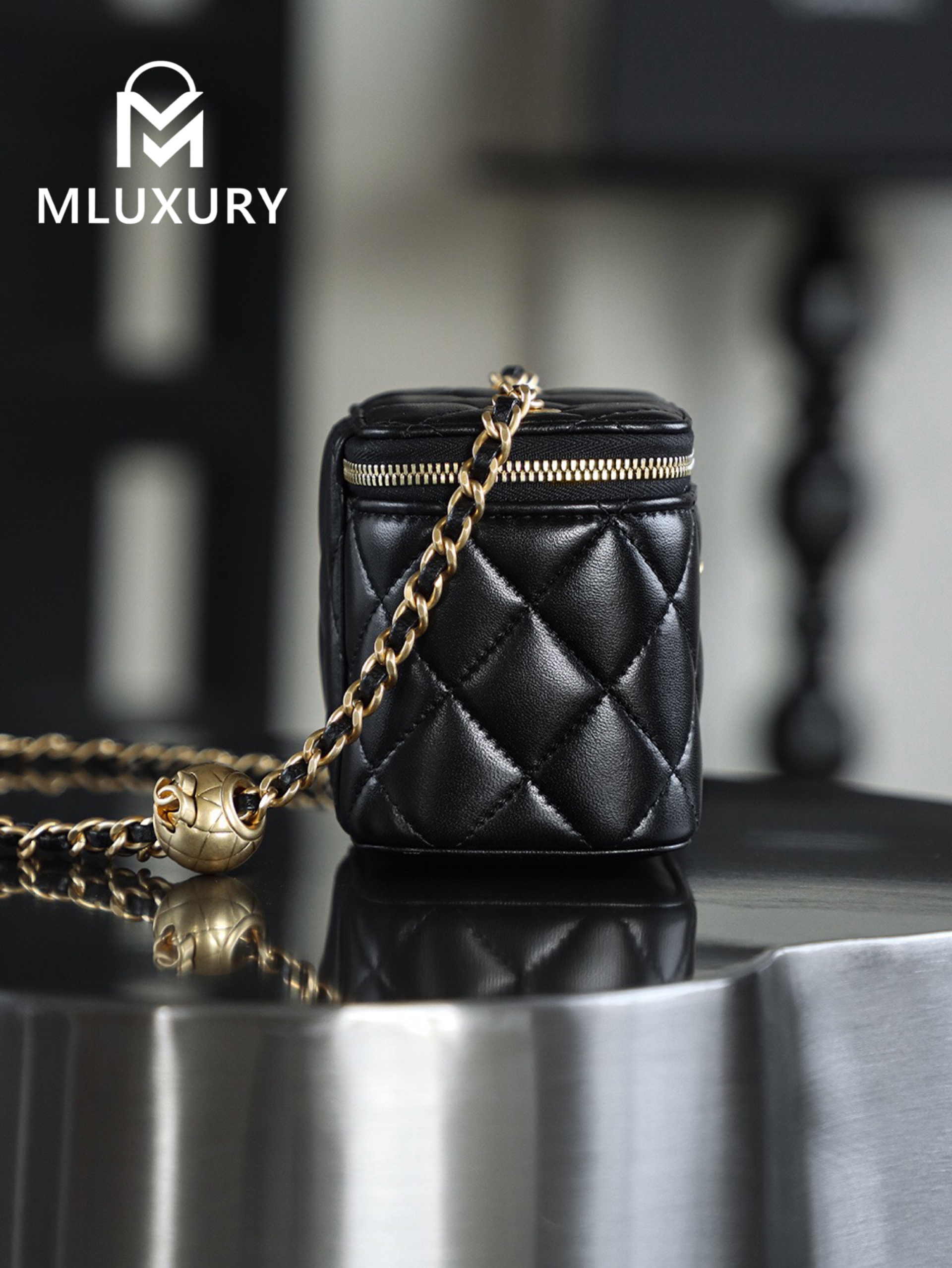 CHANEL Gold Globe Lipstick Bag