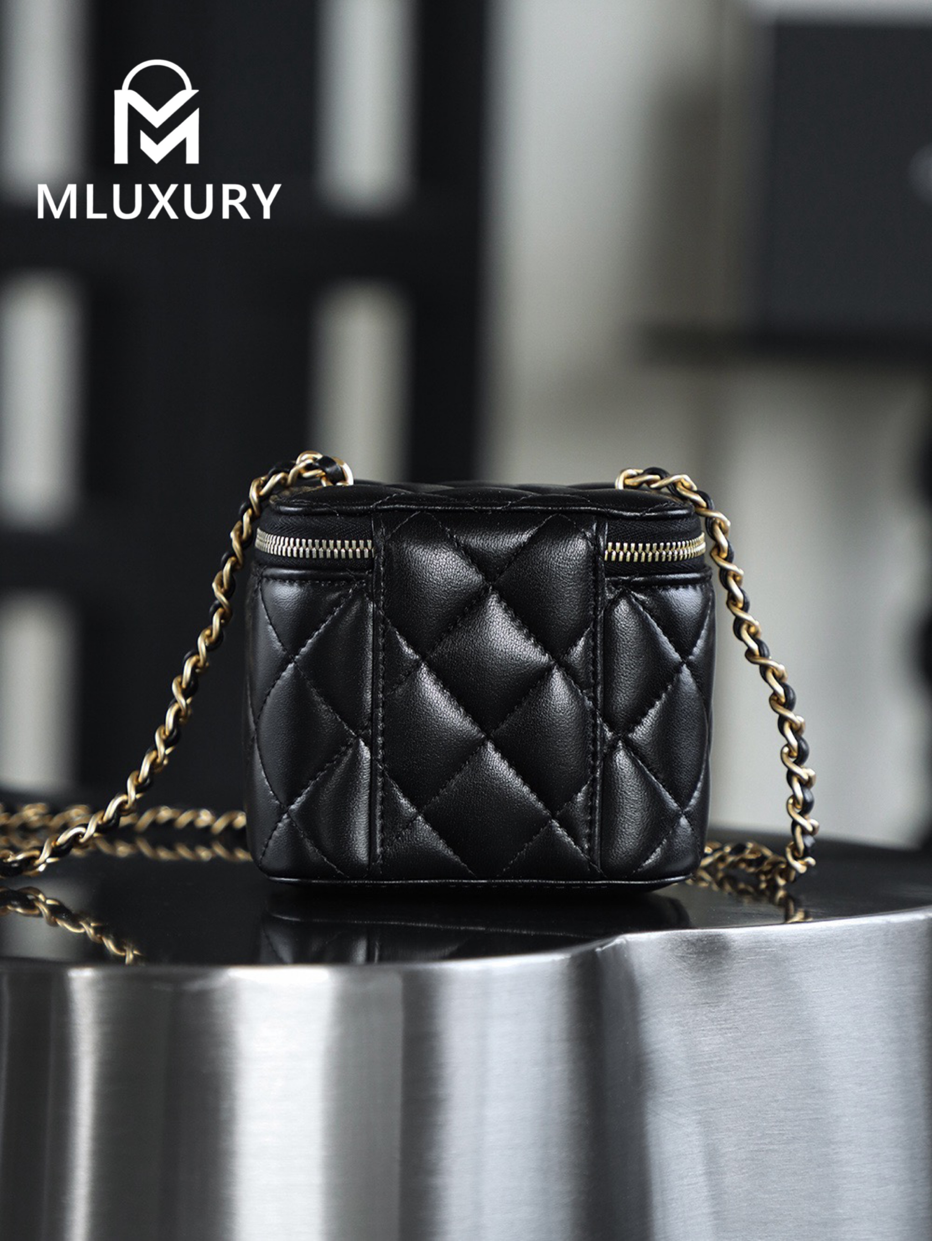 CHANEL Gold Globe Lipstick Bag