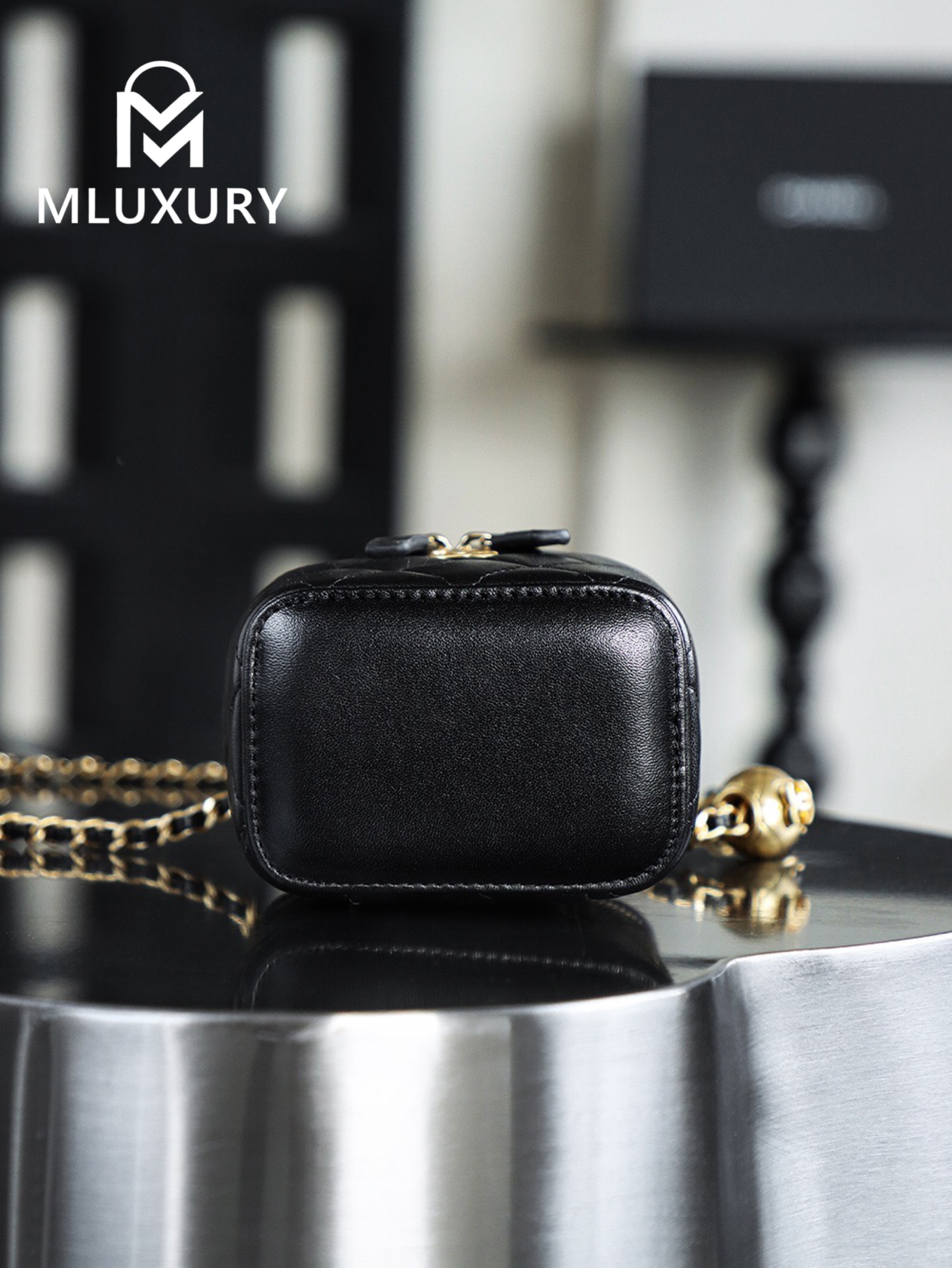 CHANEL Gold Globe Lipstick Bag