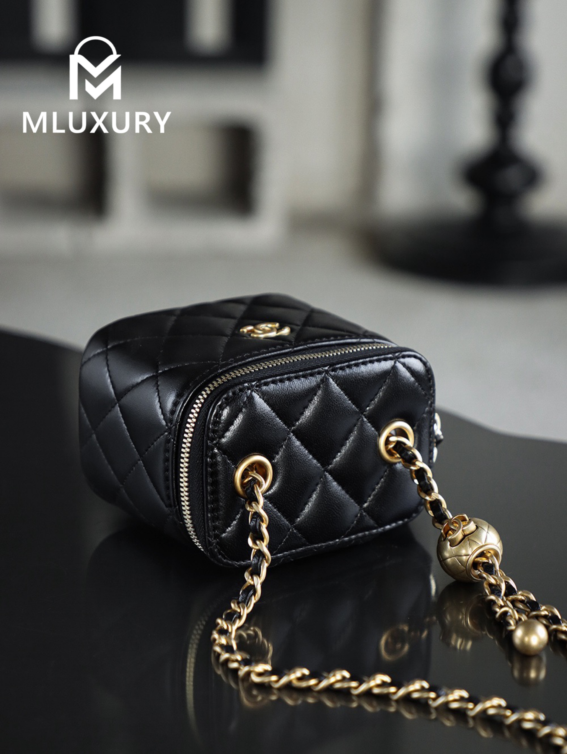 CHANEL Gold Globe Lipstick Bag