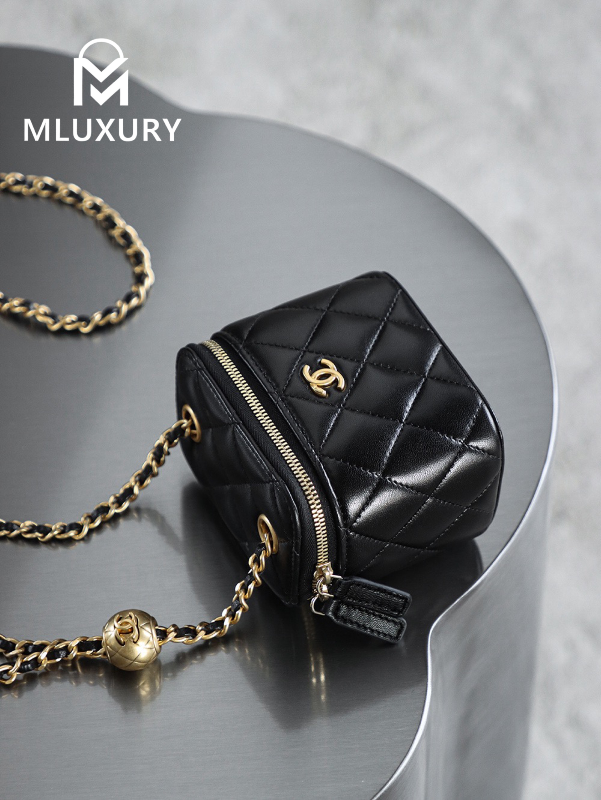 CHANEL Gold Globe Lipstick Bag