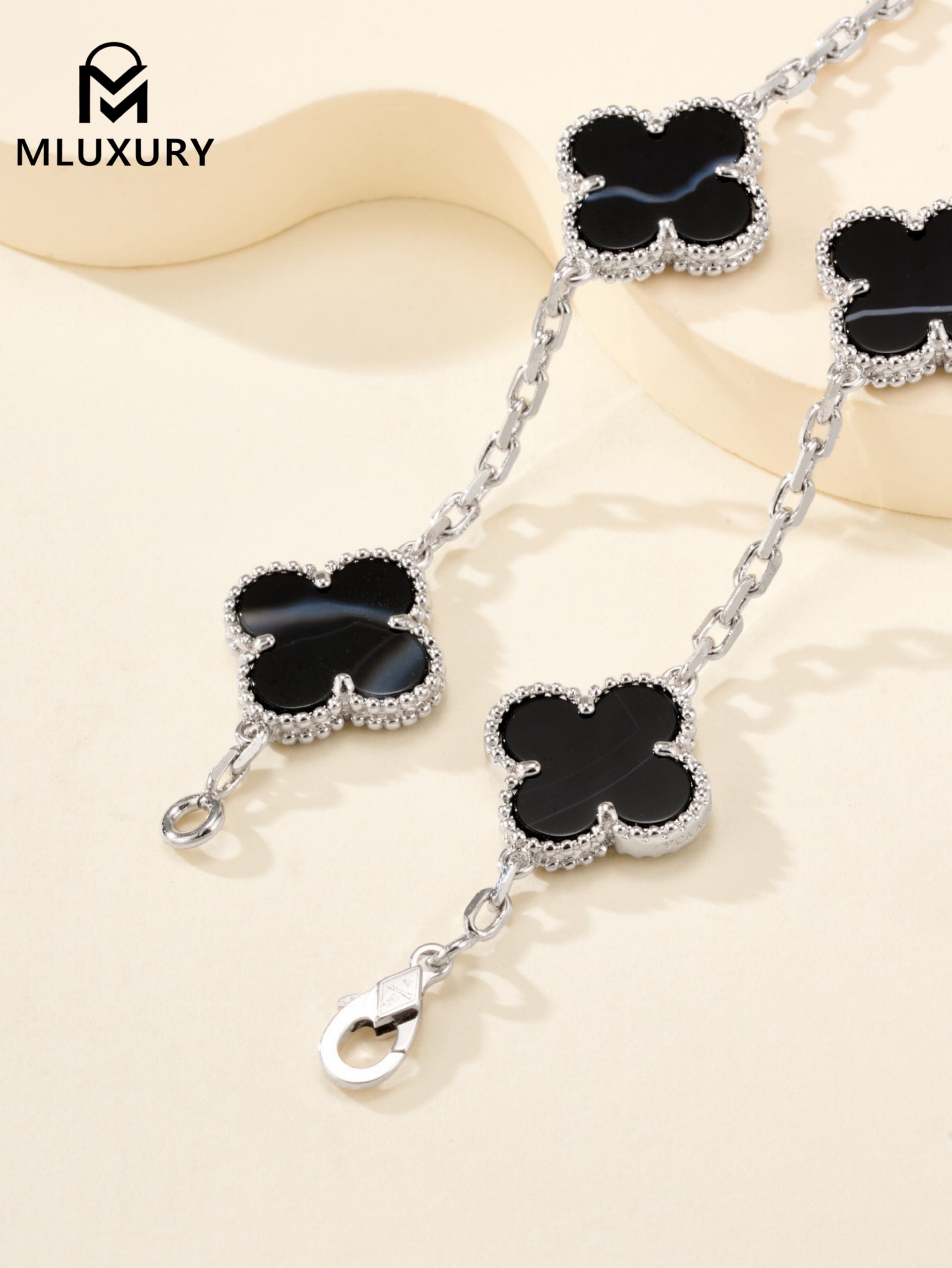 Van Cleef & Arpels Black Jacquard Five-Flower Bracelet in White Gold
