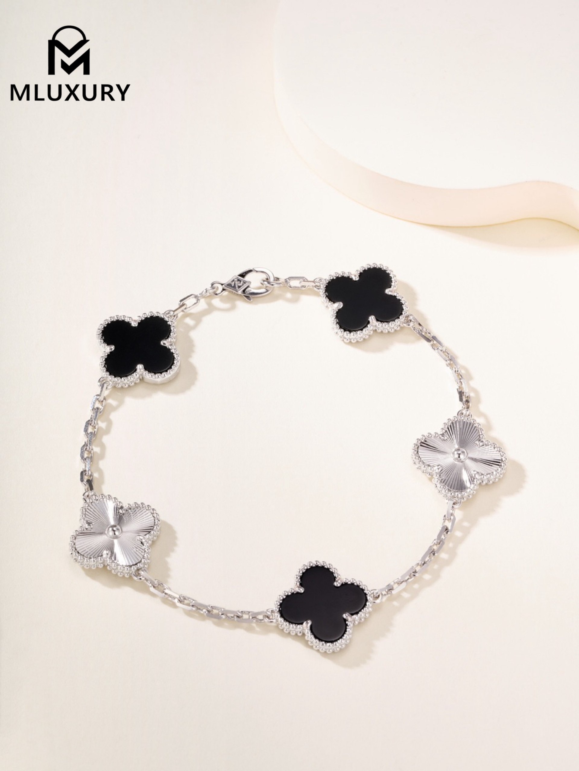 Van Cleef & Arpels Black Onyx Floral Bracelet in White Gold