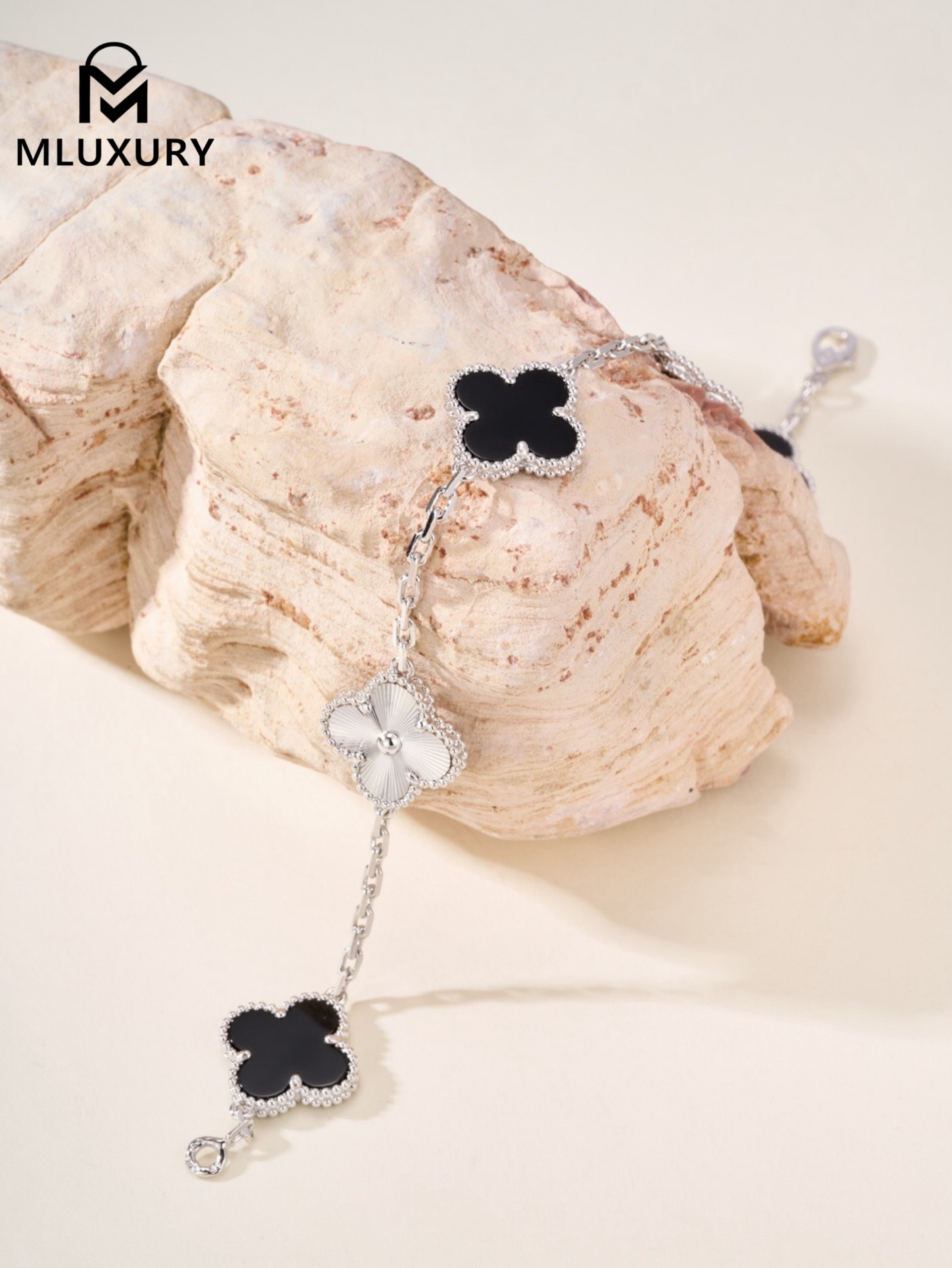 Van Cleef & Arpels Black Onyx Floral Bracelet in White Gold