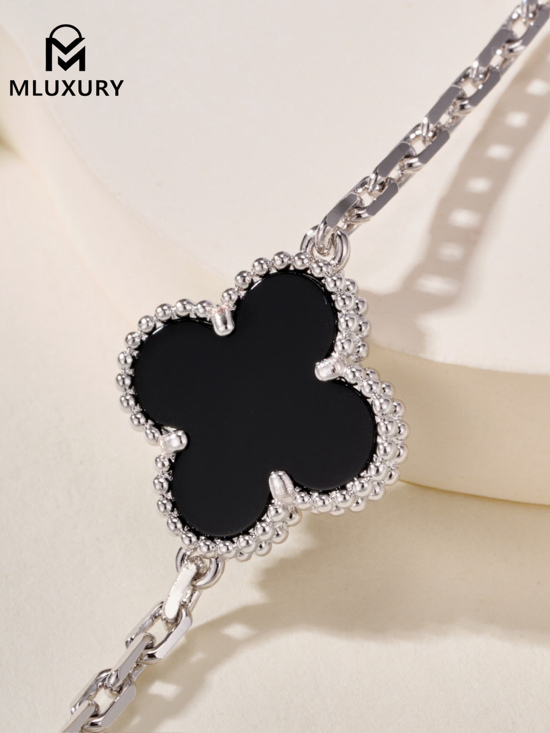 Van Cleef & Arpels Black Onyx Floral Bracelet in White Gold