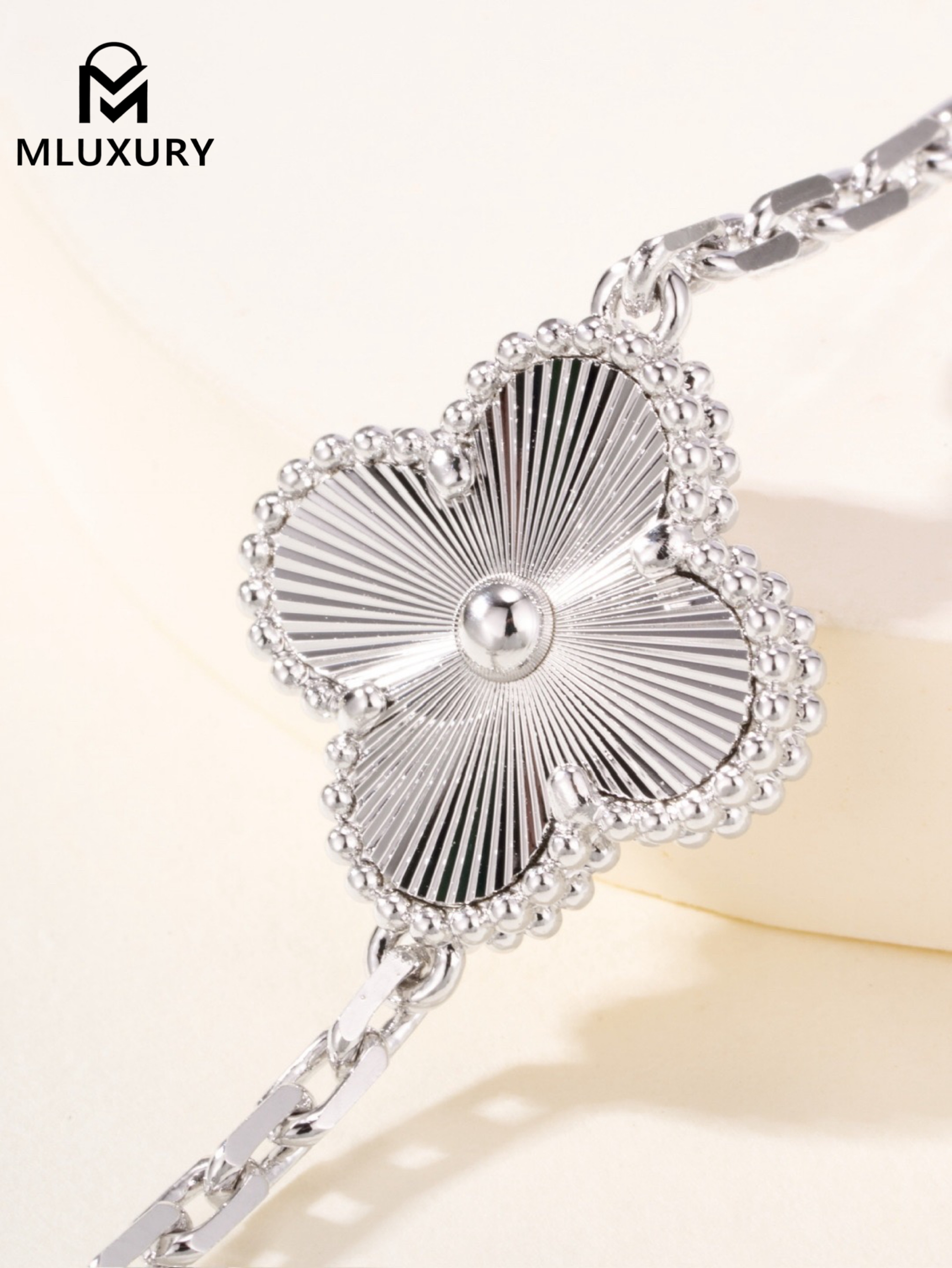 Van Cleef & Arpels Black Onyx Floral Bracelet in White Gold