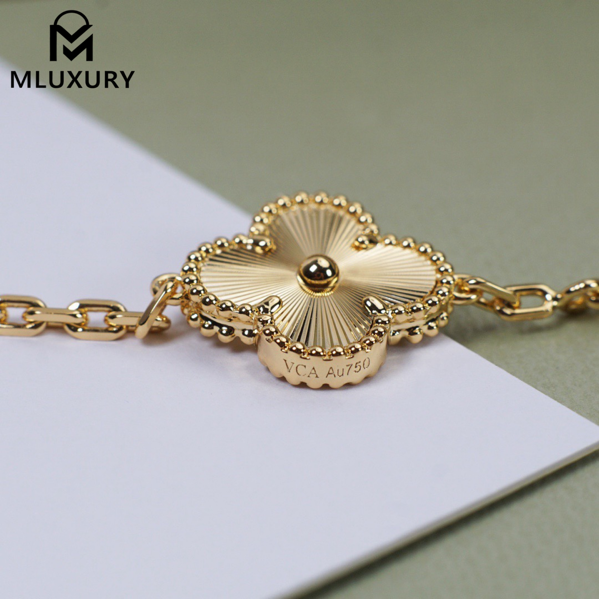 Van Cleef & Arpels laser-cut floral bracelet