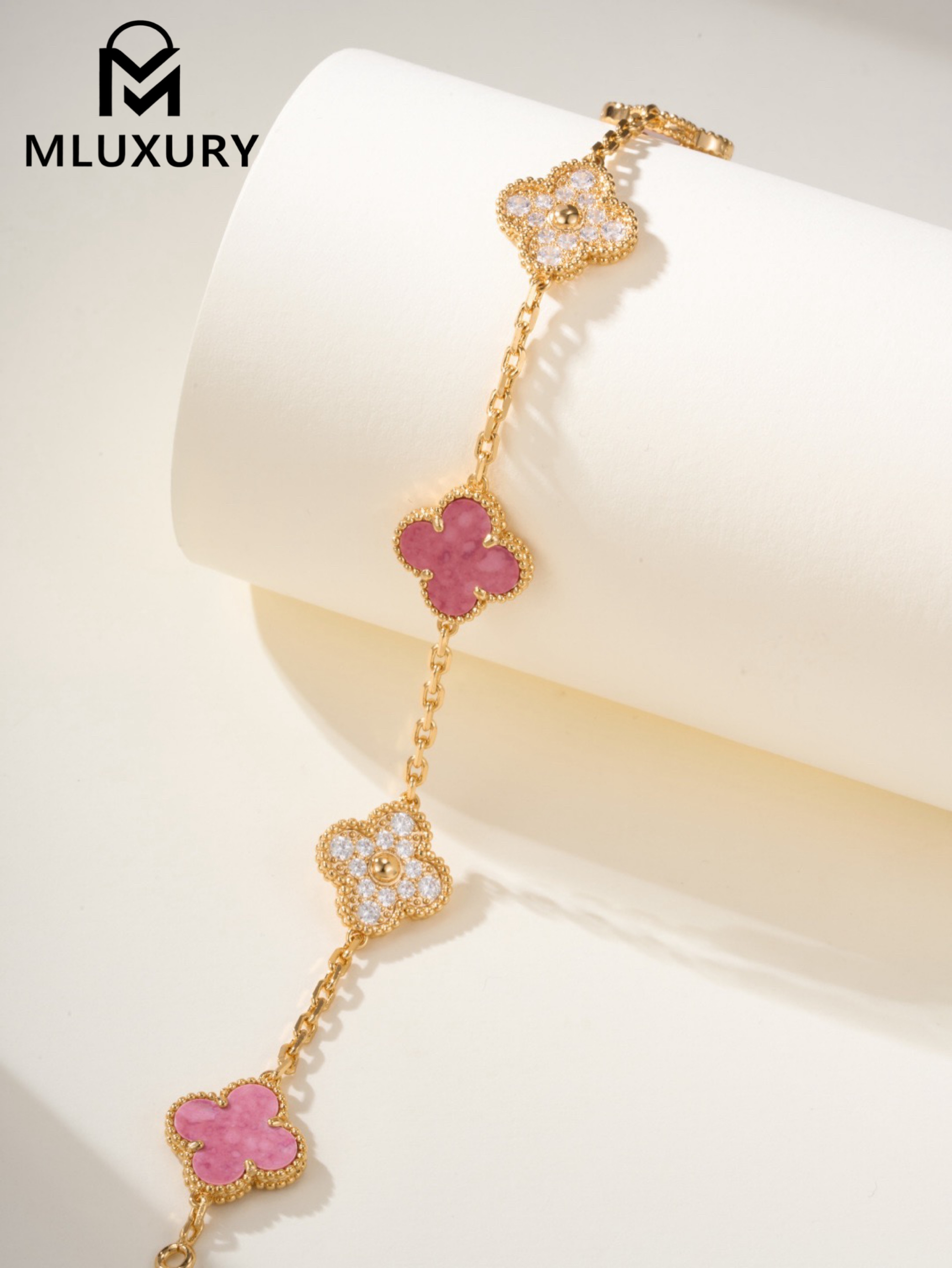 Van Cleef & Arpels interlocking diamond and rose quartz five-flower bracelet