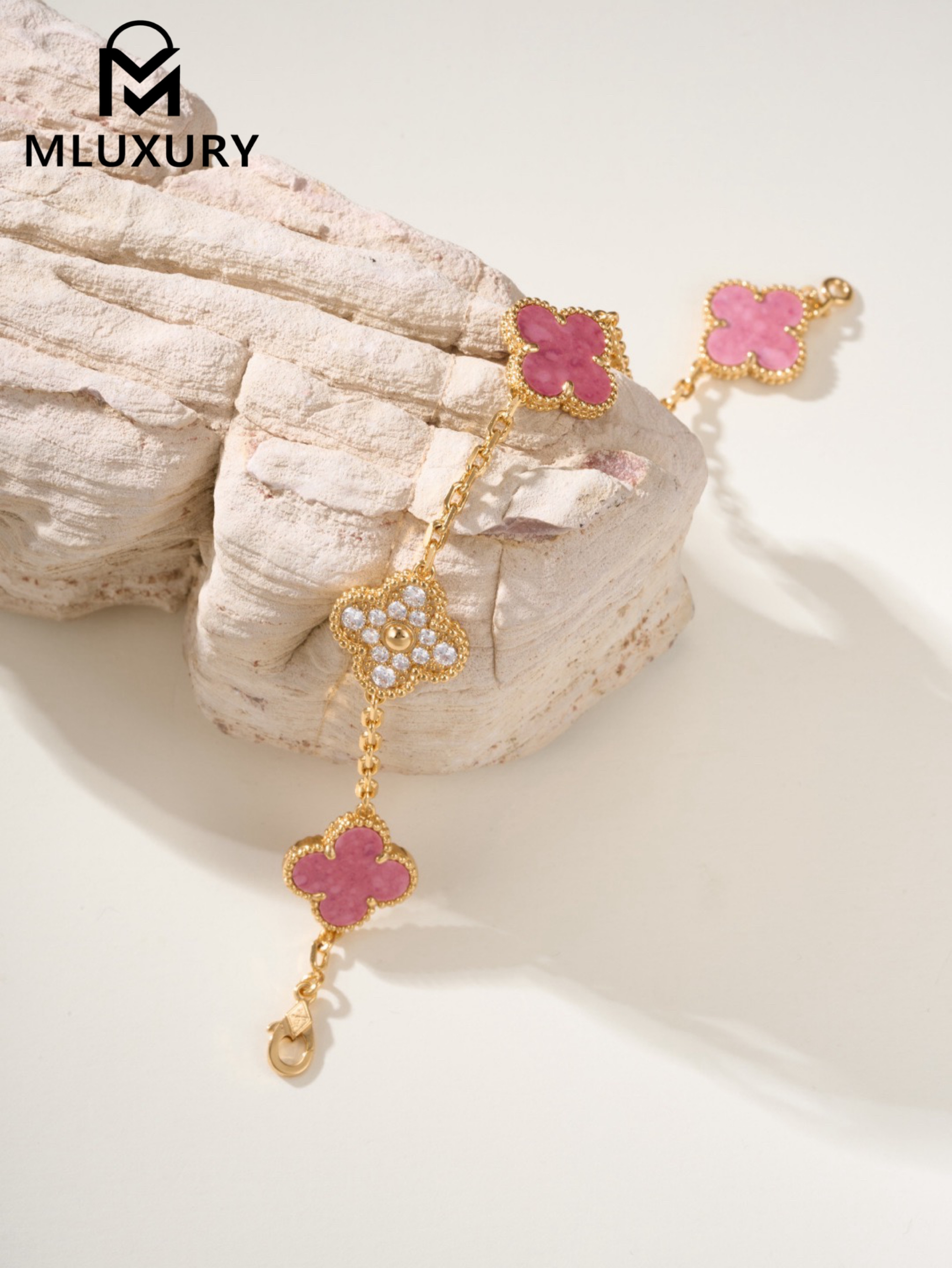 Van Cleef & Arpels interlocking diamond and rose quartz five-flower bracelet