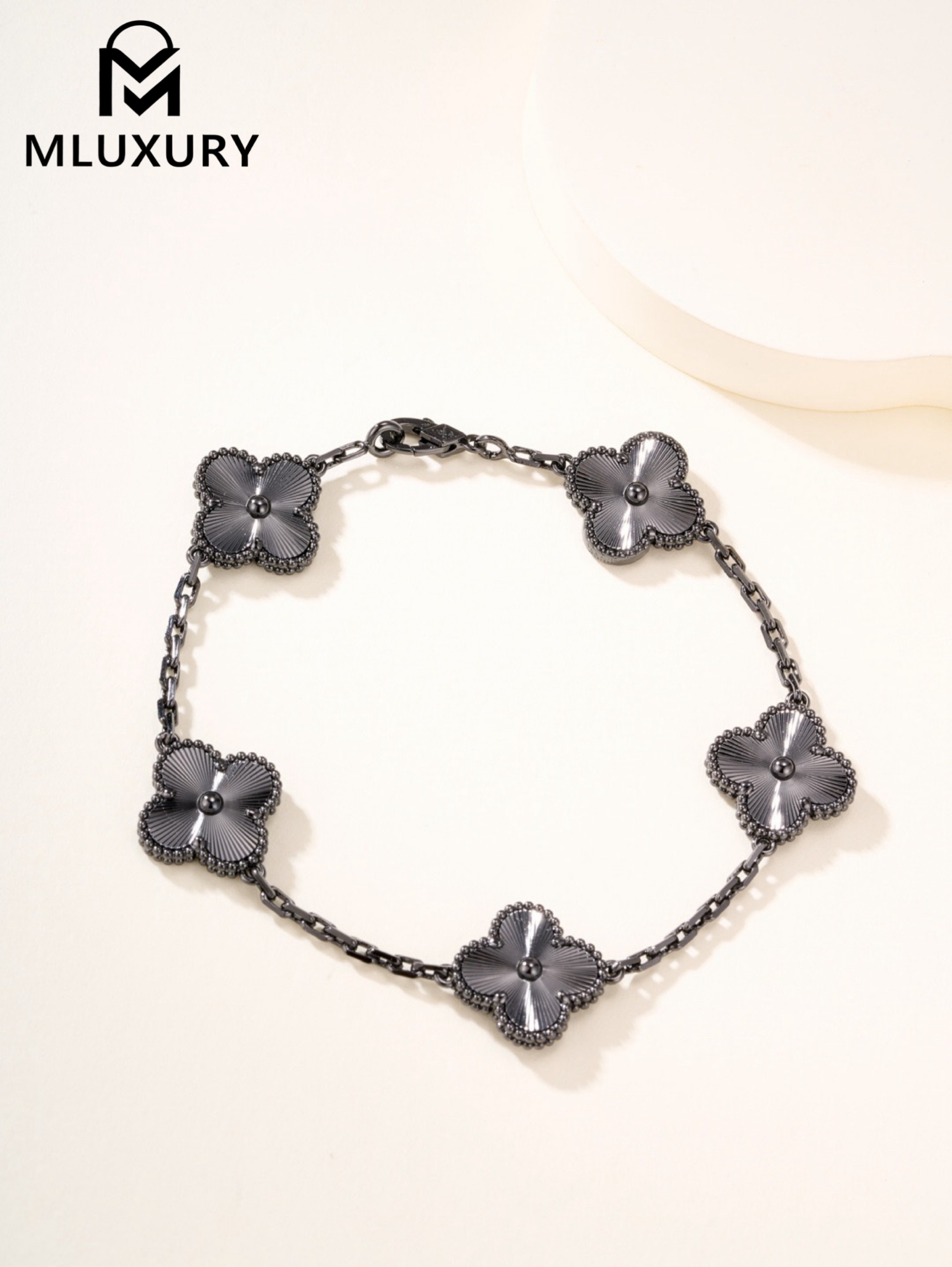 Van Cleef & Arpels Black Gold Laser Five-Flower Bracelet