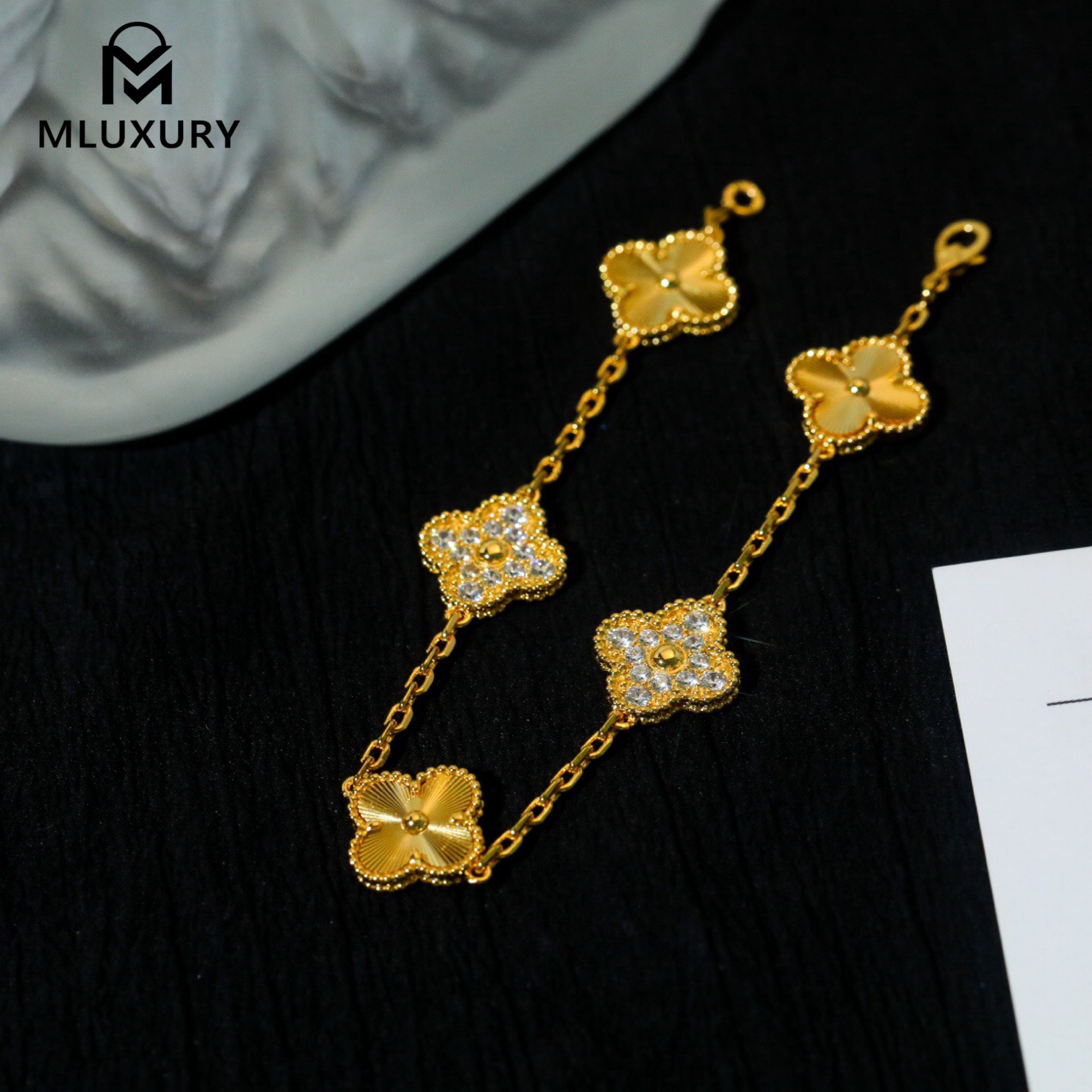 Van Cleef & Arpels classic engraved gold five-flower bracelet