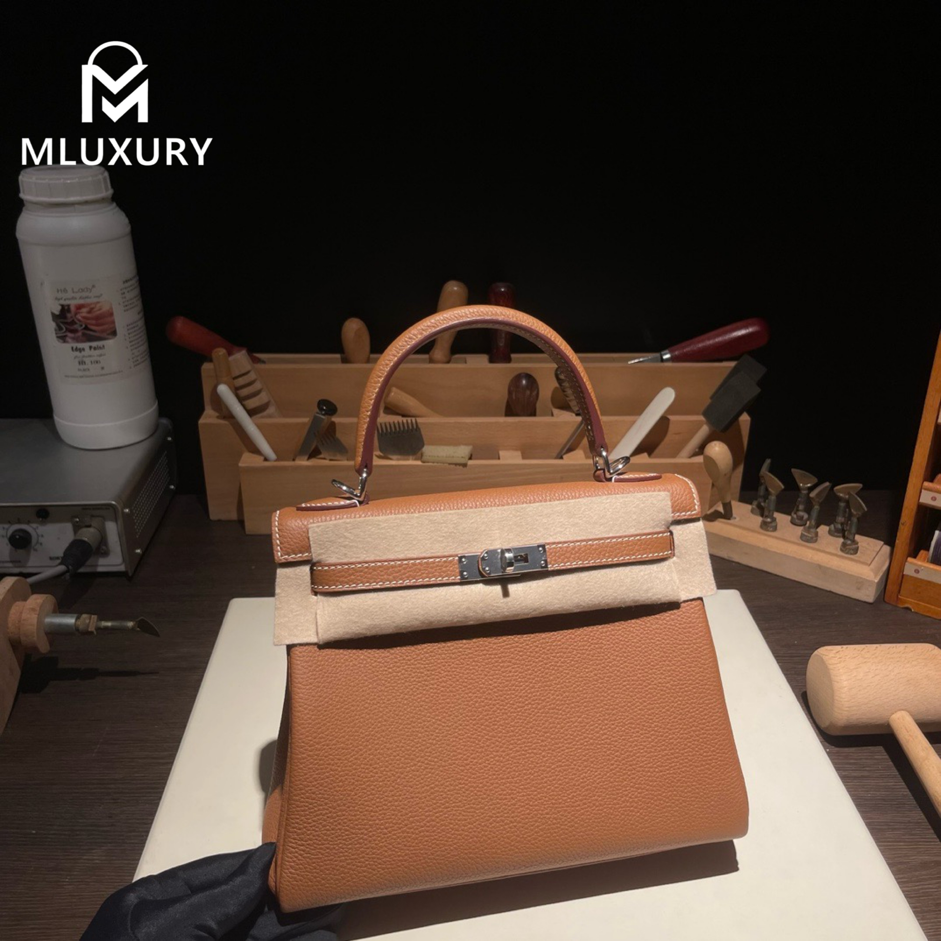 Hermès Kelly 25 Togo leather with inner stitching, Gold-brown, Silver hardware