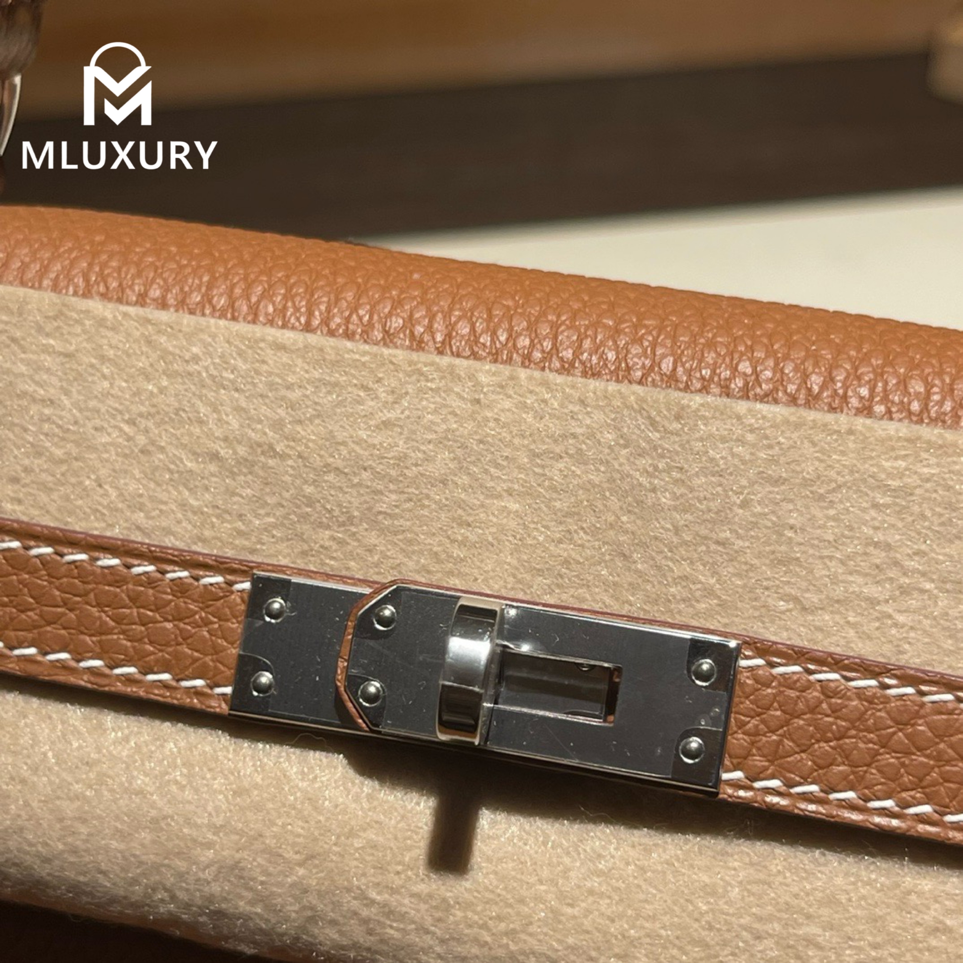 Hermès Kelly 25 Togo leather with inner stitching, Gold-brown, Silver hardware