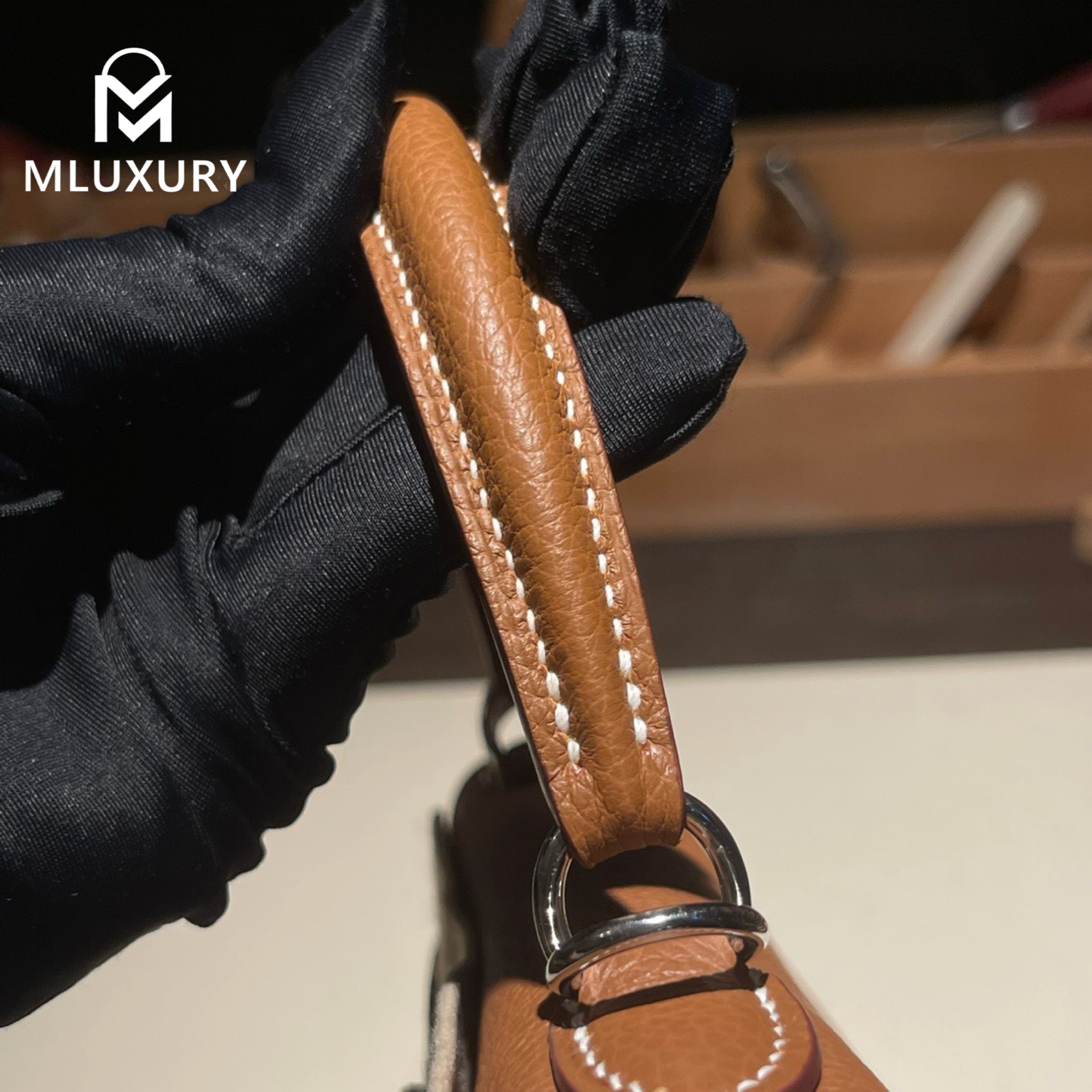 Hermès Kelly 25 Togo leather with inner stitching, Gold-brown, Silver hardware