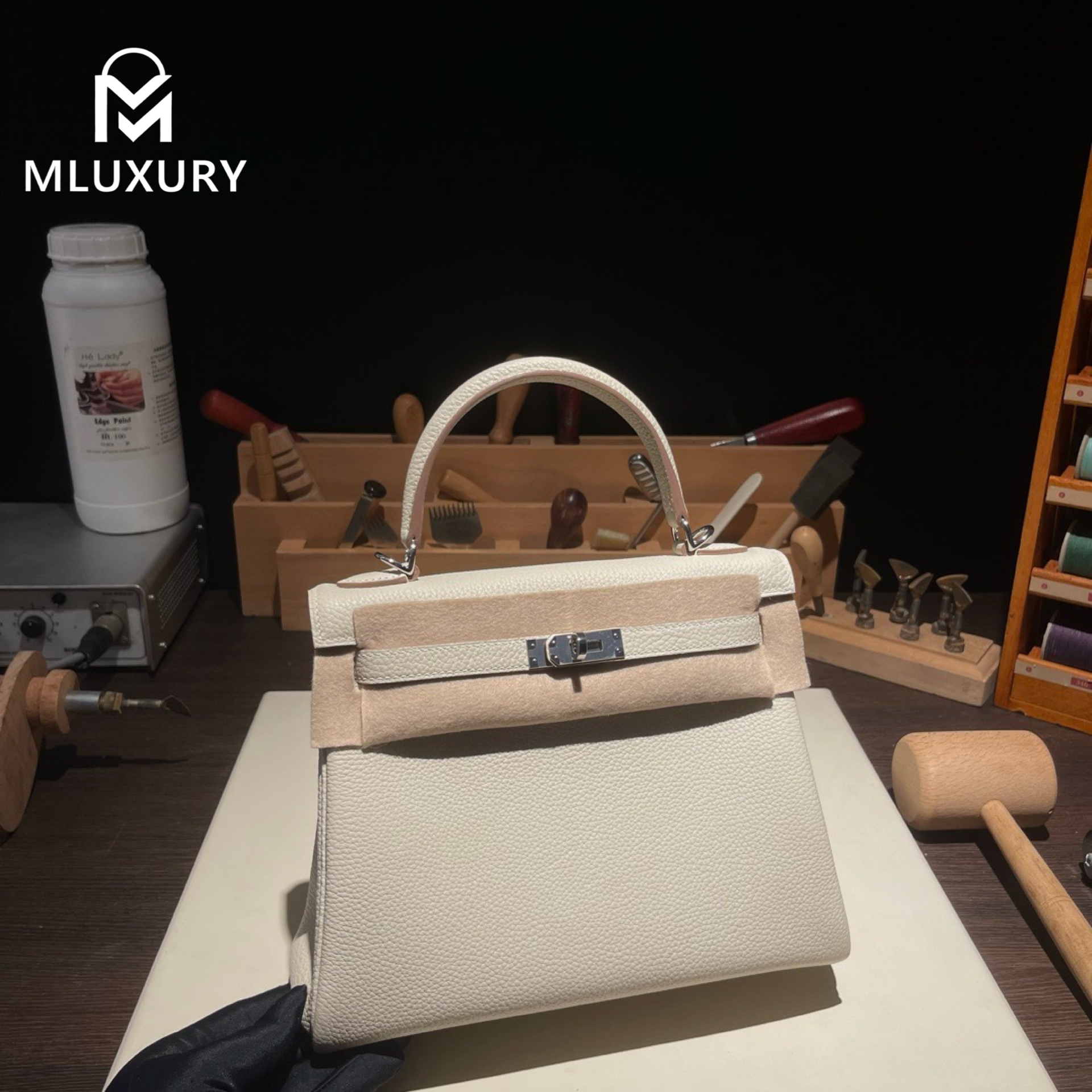 Hermès Kelly 25 Togo leather with inner stitching, Milkshake white, Silver hardware