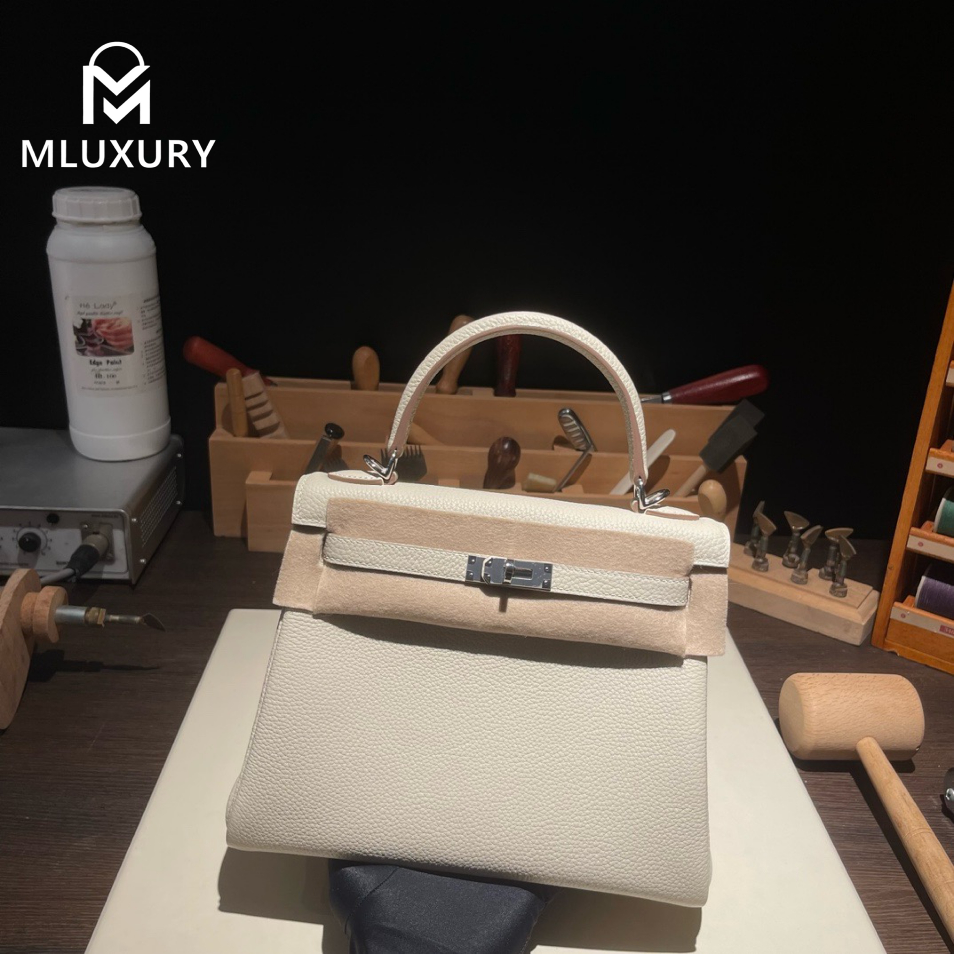 Hermès Kelly 25 Togo leather with inner stitching, Milkshake white, Silver hardware