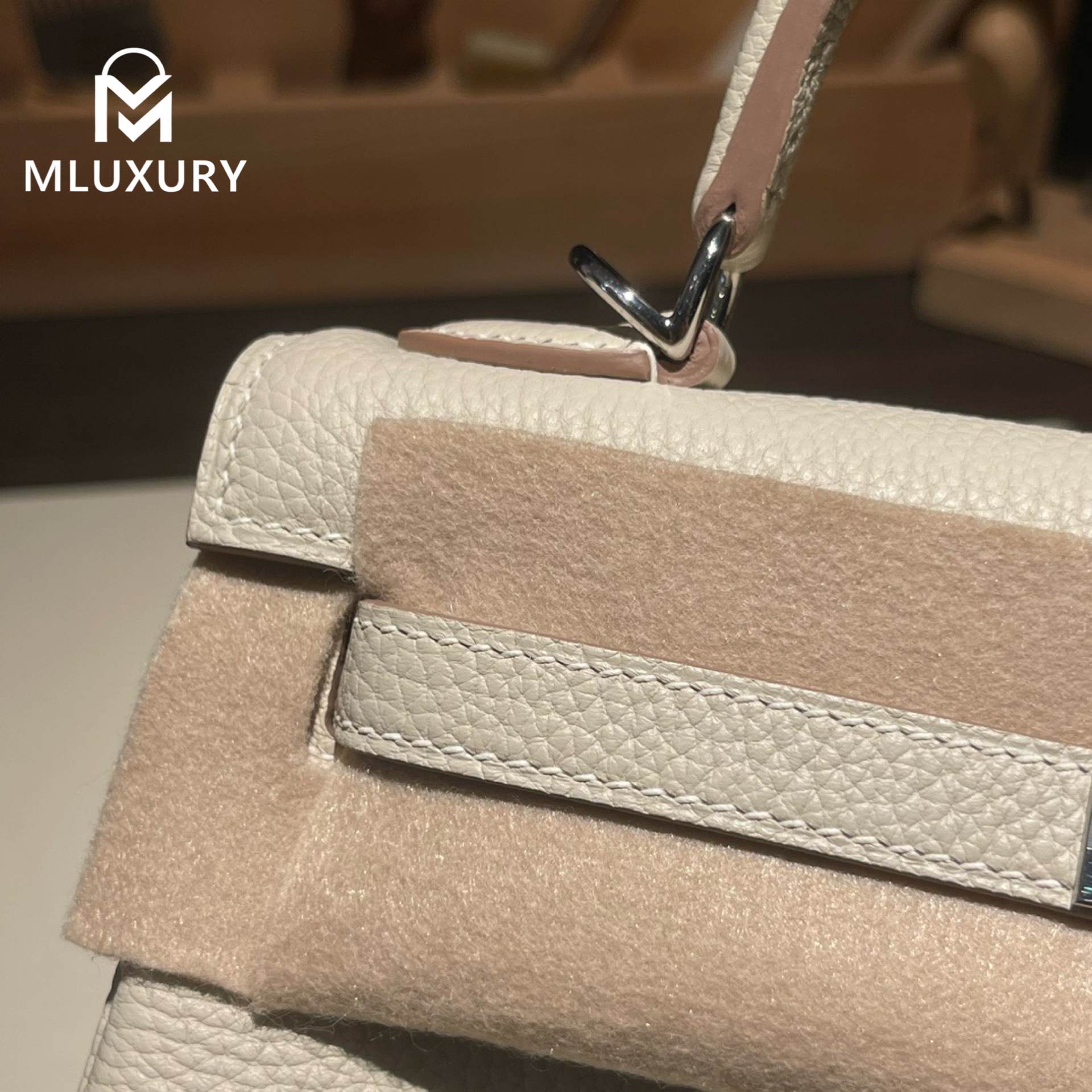 Hermès Kelly 25 Togo leather with inner stitching, Milkshake white, Silver hardware