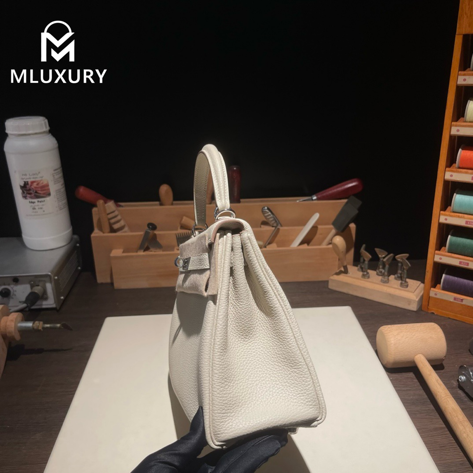 Hermès Kelly 25 Togo leather with inner stitching, Milkshake white, Silver hardware