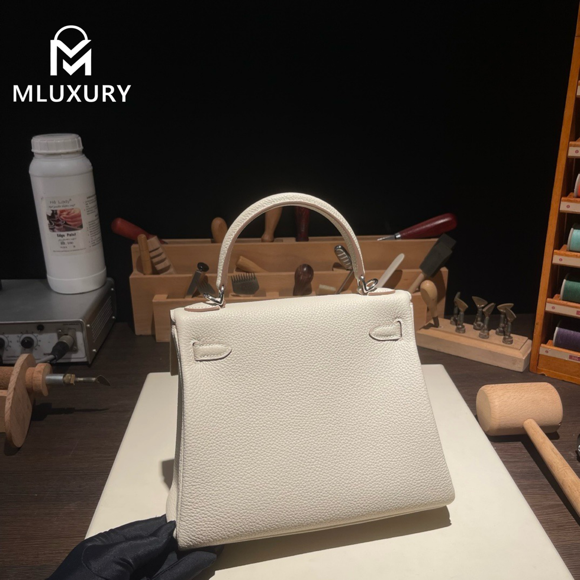 Hermès Kelly 25 Togo leather with inner stitching, Milkshake white, Silver hardware