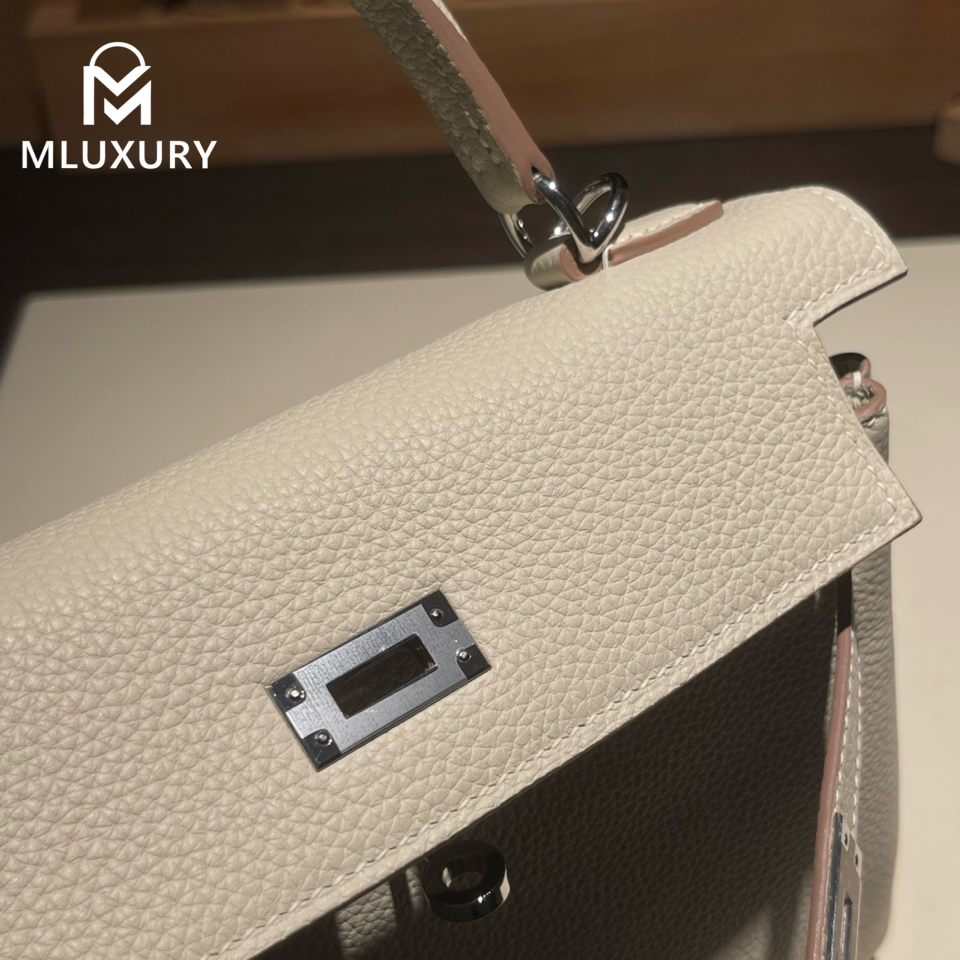 Hermès Kelly 25 Togo leather with inner stitching, Milkshake white, Silver hardware