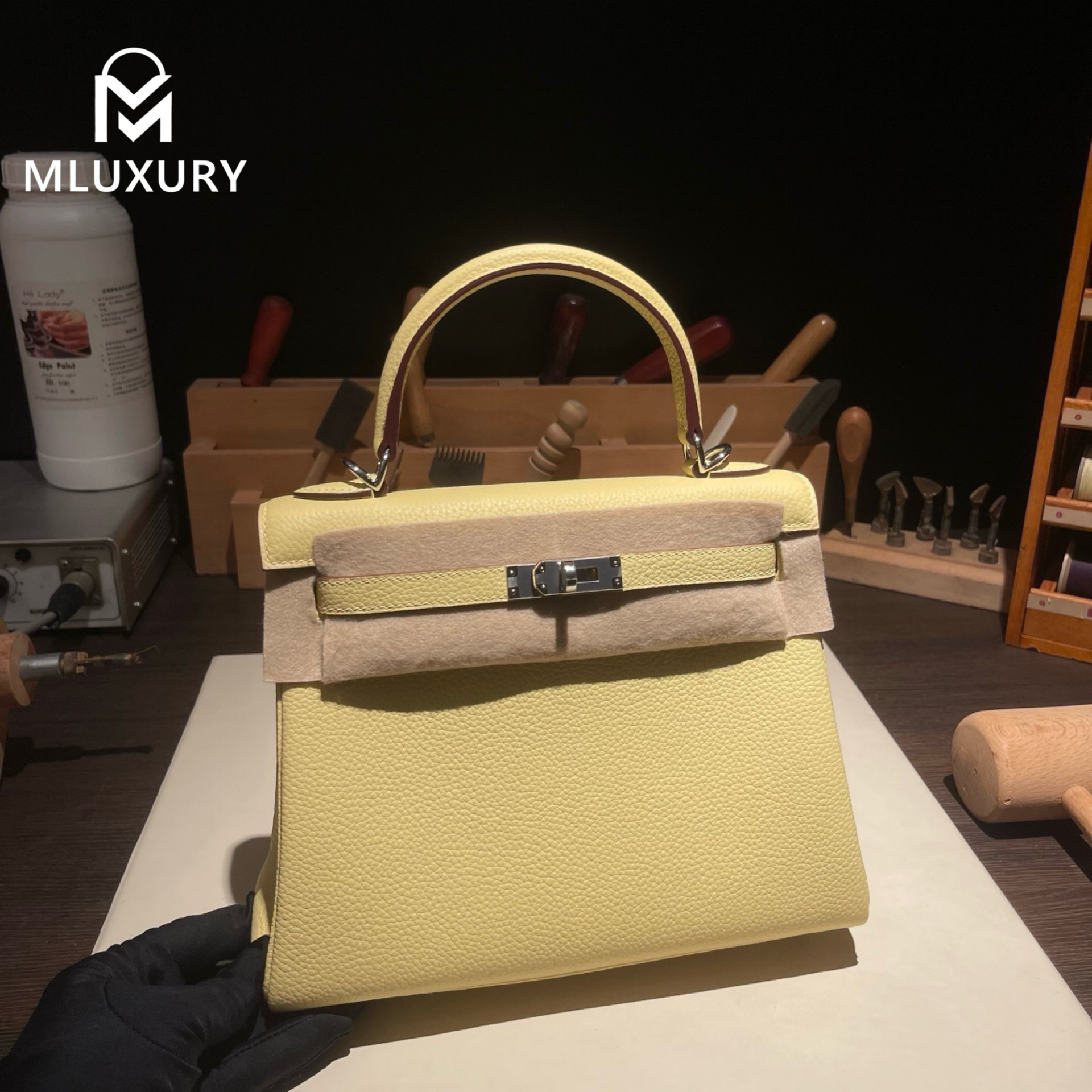Hermès Kelly 25, Togo leather with inner stitching, Chick yellow color, Silver hardware