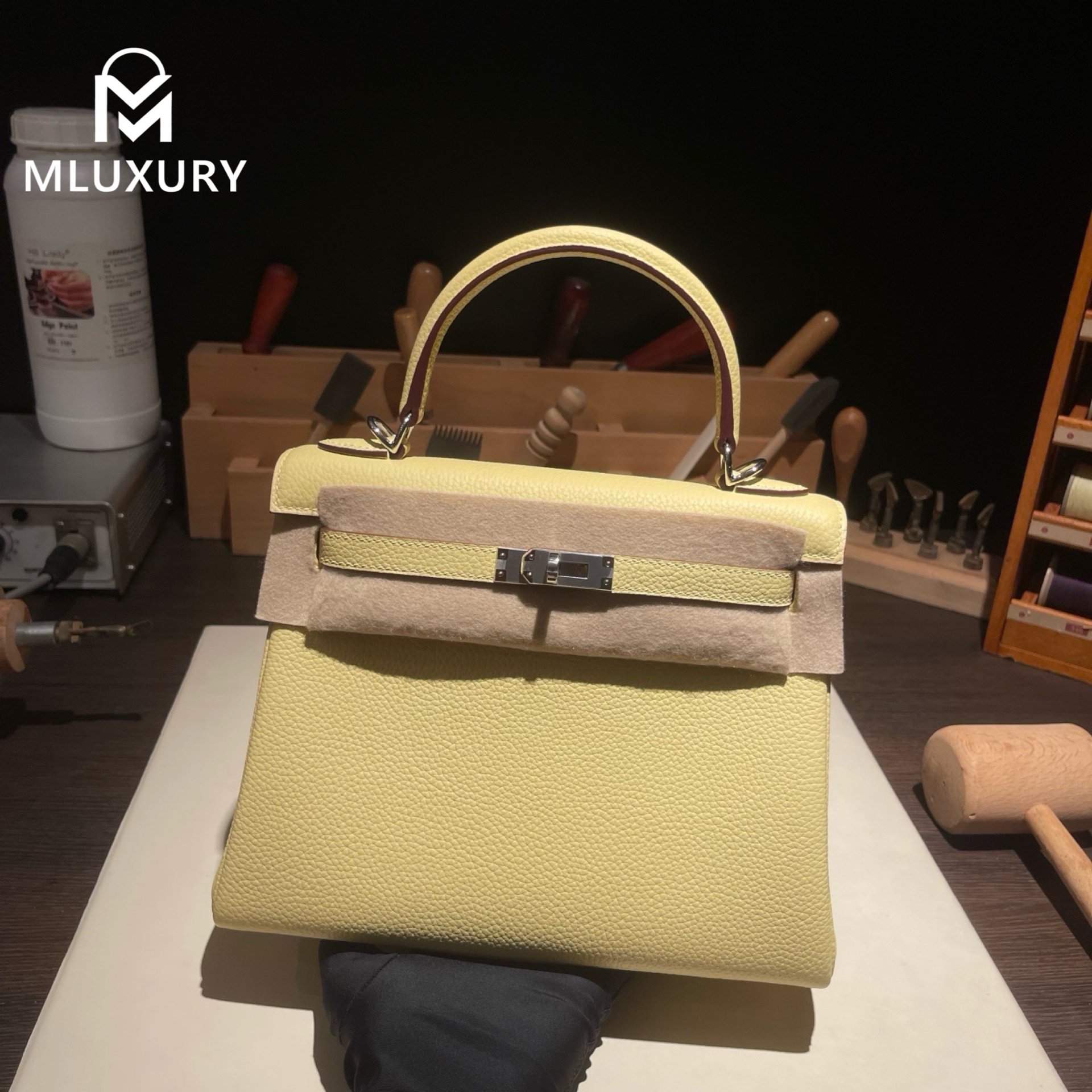 Hermès Kelly 25, Togo leather with inner stitching, Chick yellow color, Silver hardware