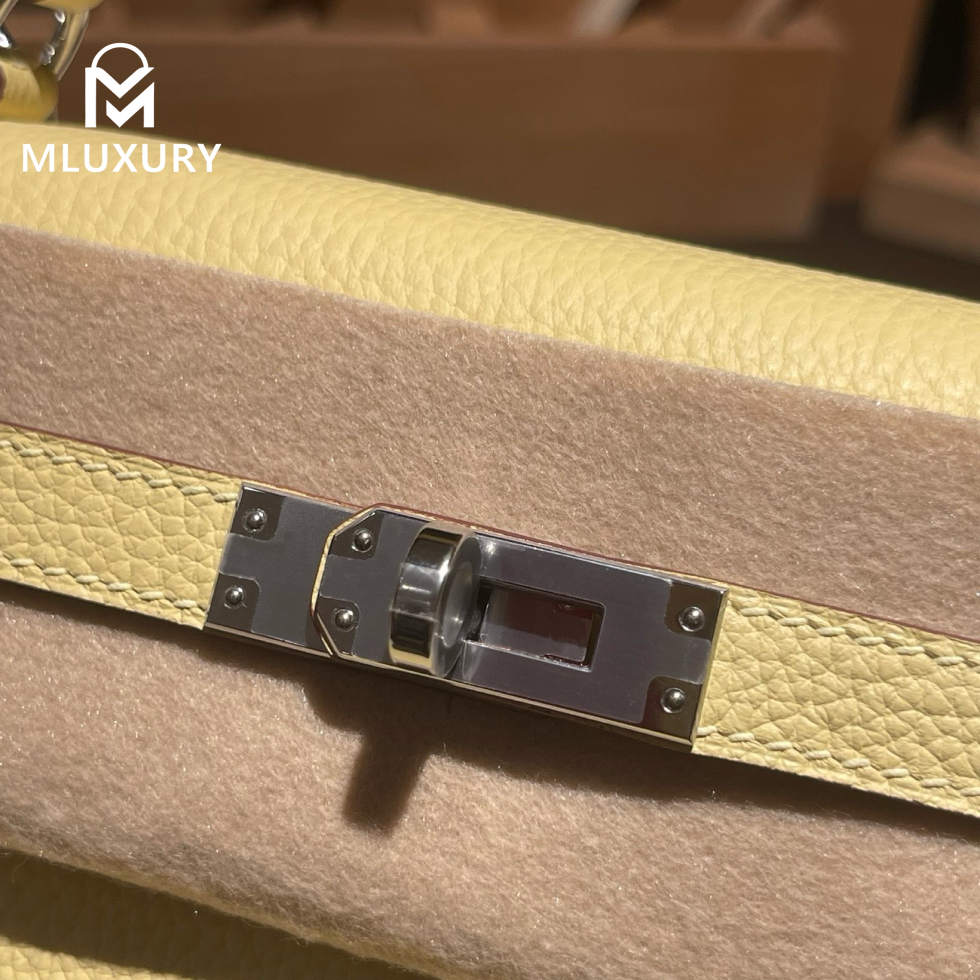Hermès Kelly 25, Togo leather with inner stitching, Chick yellow color, Silver hardware