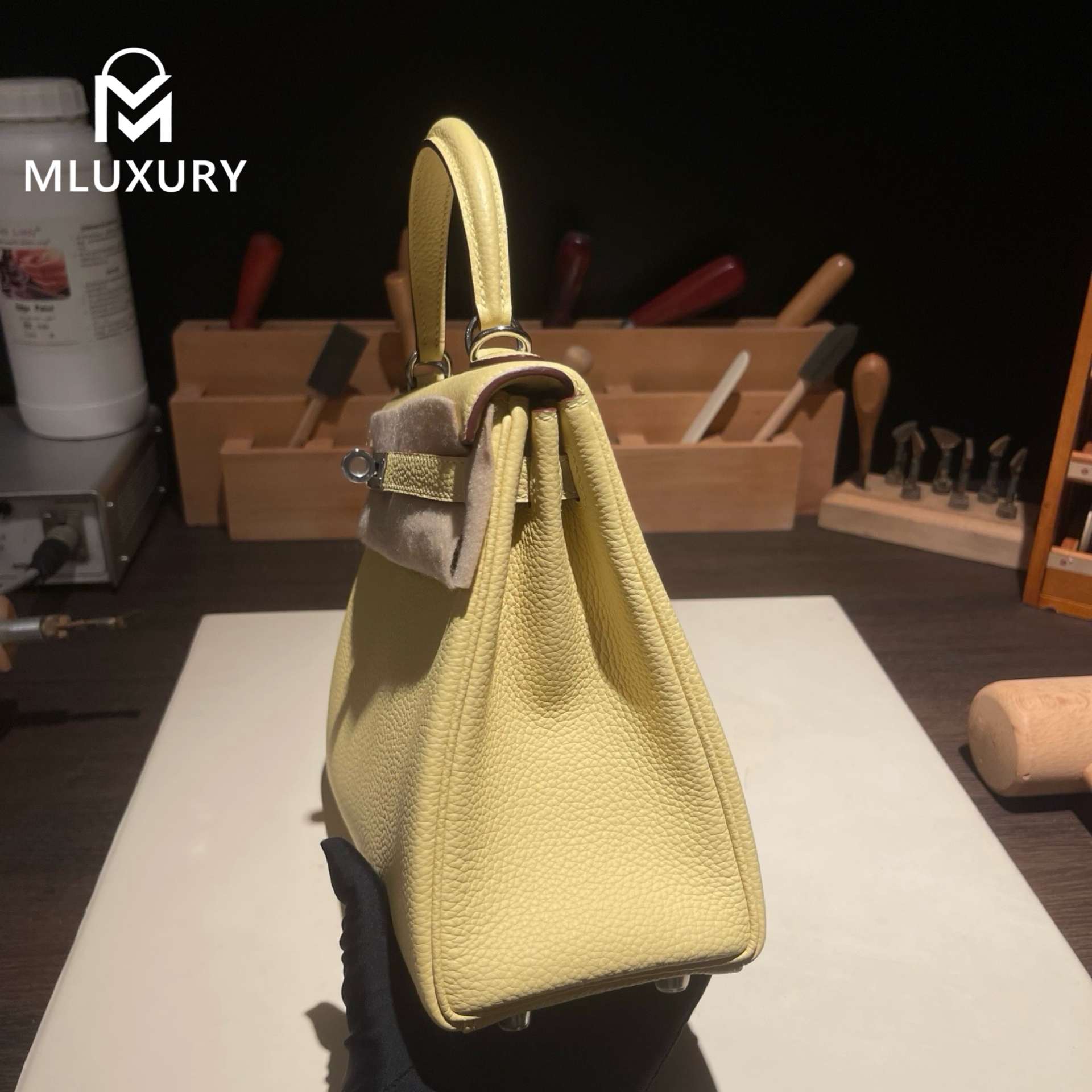 Hermès Kelly 25, Togo leather with inner stitching, Chick yellow color, Silver hardware