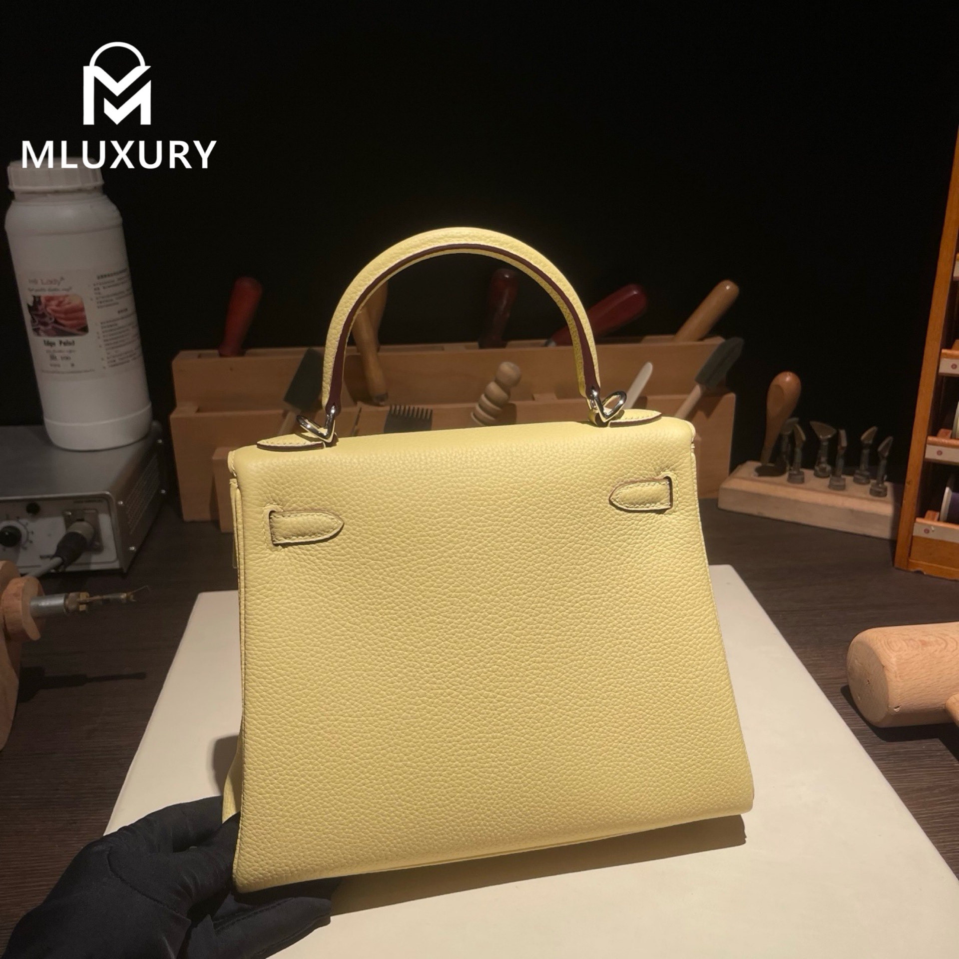 Hermès Kelly 25, Togo leather with inner stitching, Chick yellow color, Silver hardware