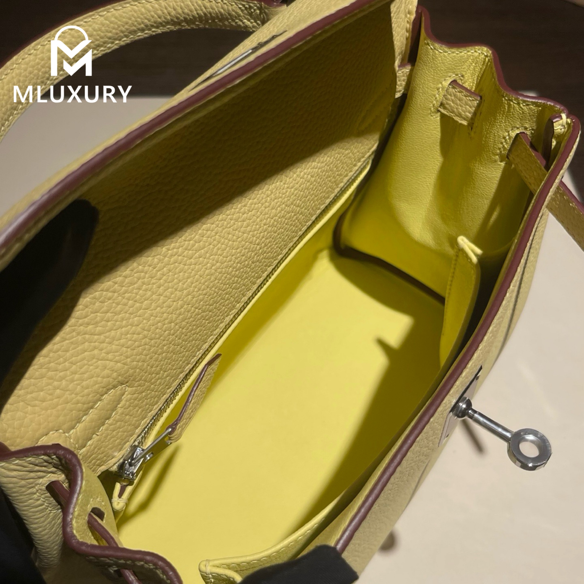 Hermès Kelly 25, Togo leather with inner stitching, Chick yellow color, Silver hardware