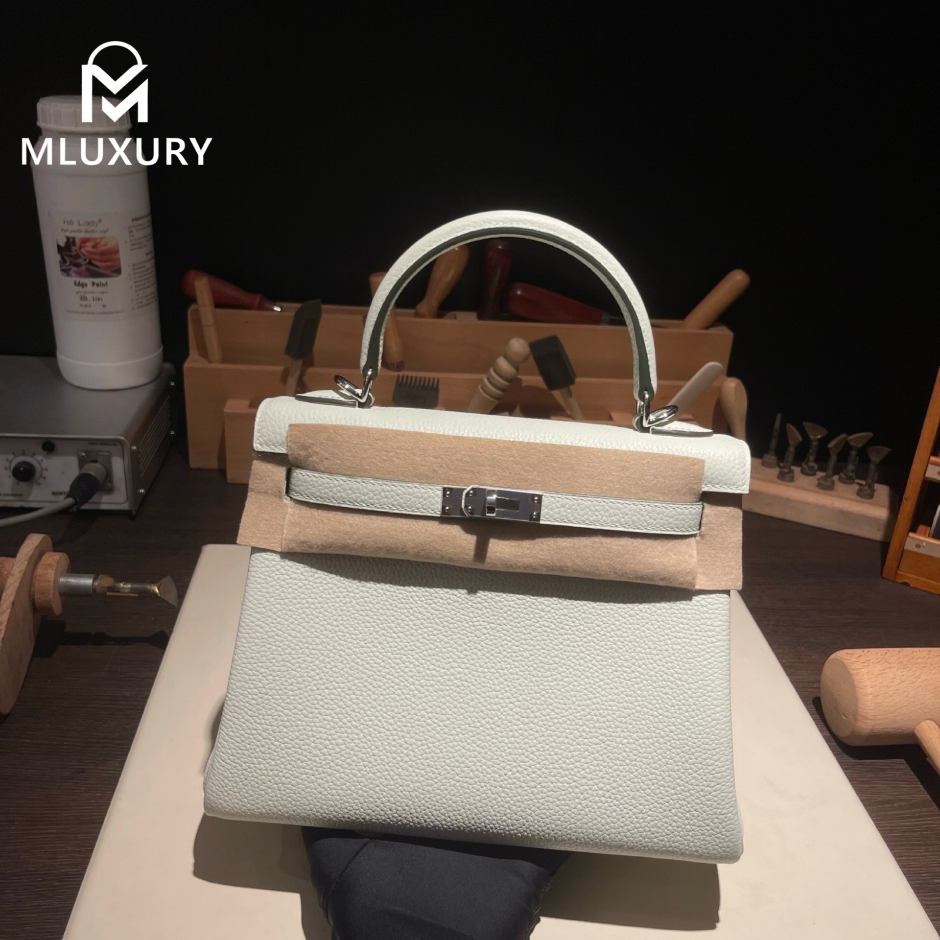 Hermès Kelly 25, Togo leather with inner stitching, Bubble green, Silver hardware