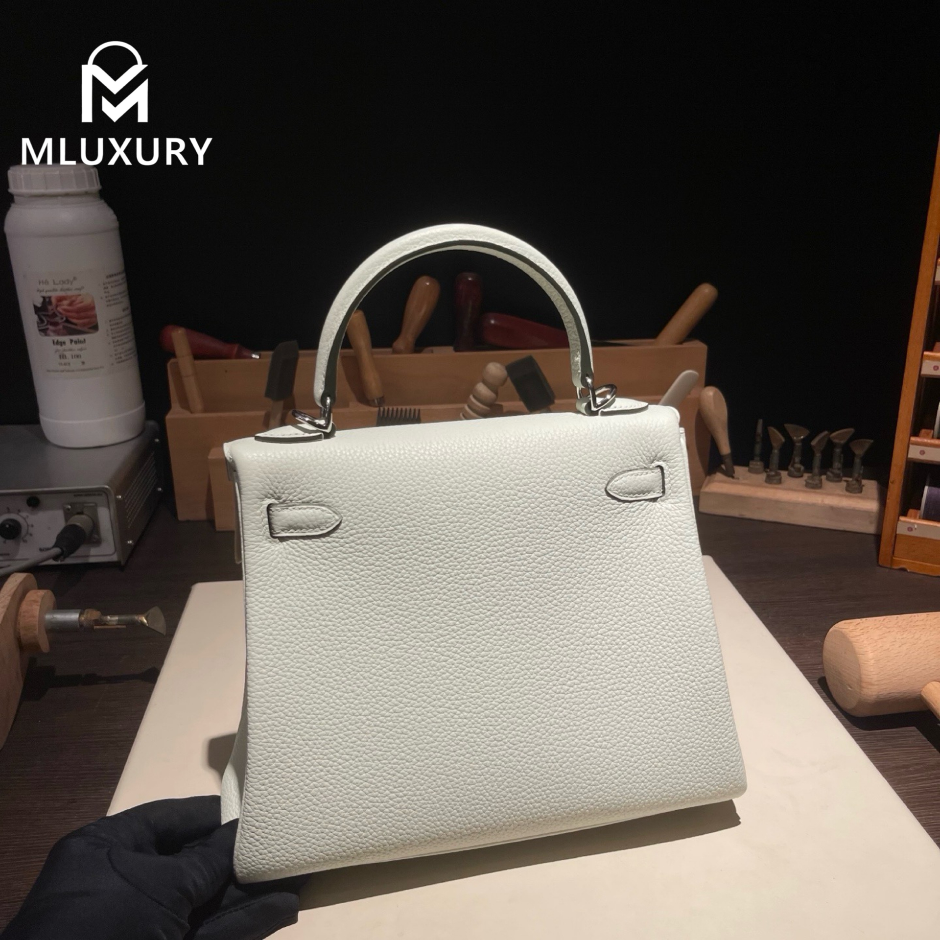 Hermès Kelly 25, Togo leather with inner stitching, Bubble green, Silver hardware