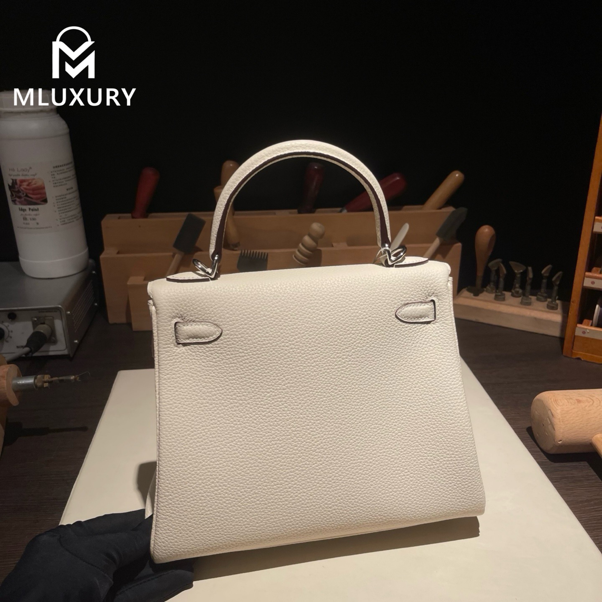 Hermès Kelly 25, Togo leather with inner stitching, Cream white, Silver hardware