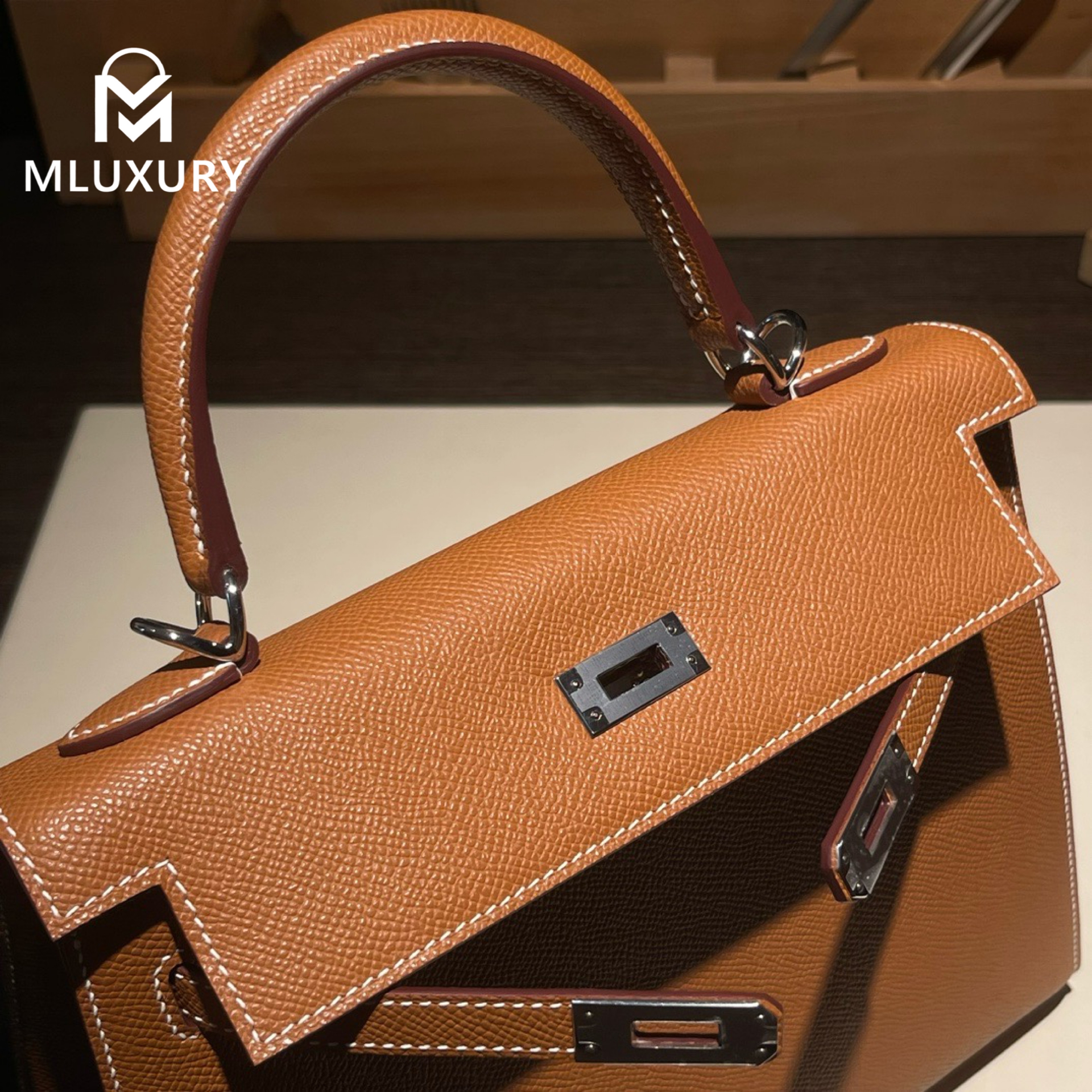 Hermès Kelly 25, Epsom leather exterior, 37 gold brown, silver hardware