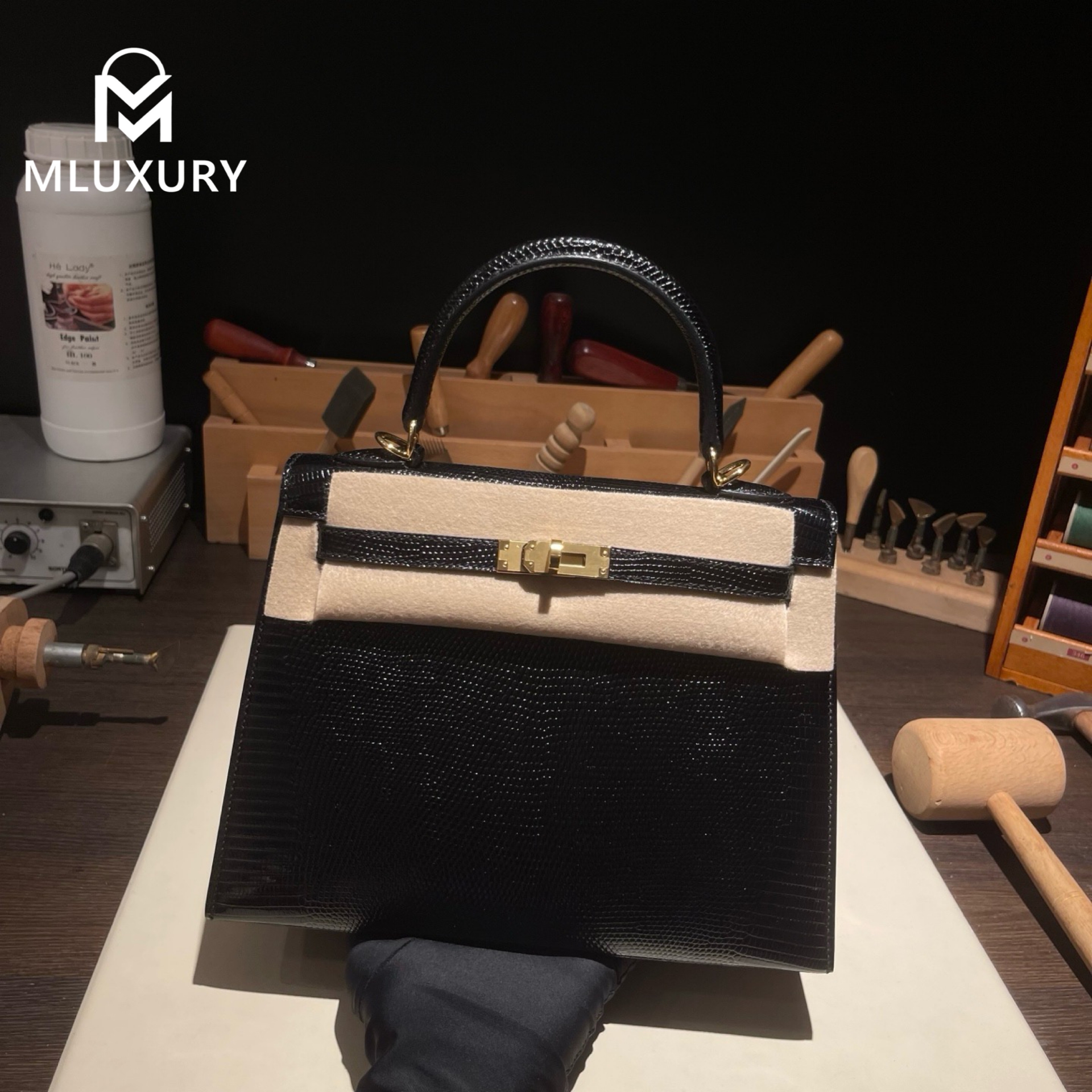 Hermès Kelly 25, lizard skin, black, gold hardware