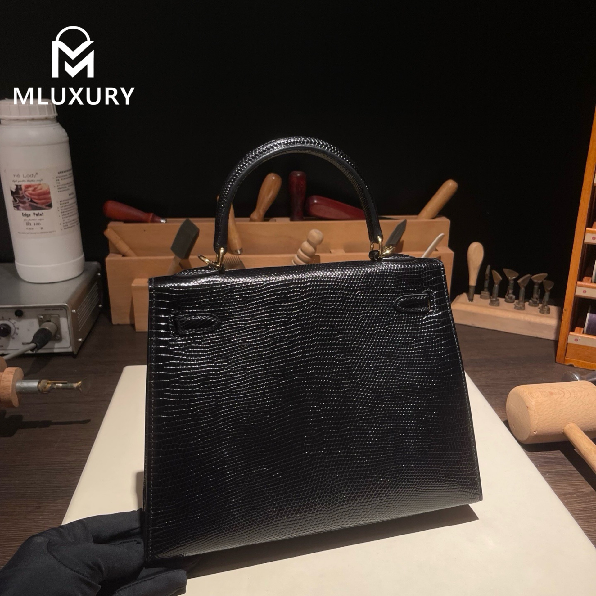 Hermès Kelly 25, lizard skin, black, gold hardware