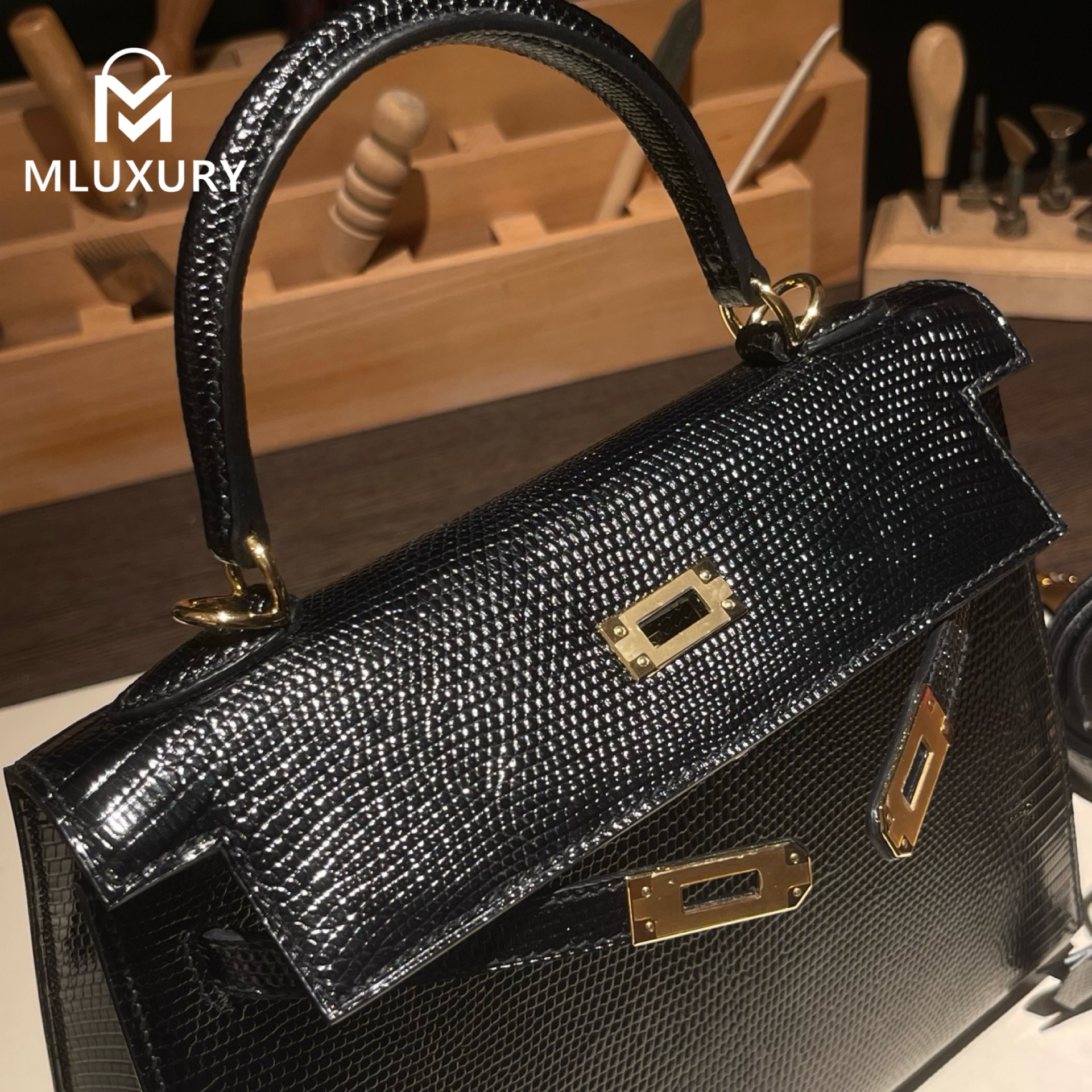Hermès Kelly 25, lizard skin, black, gold hardware