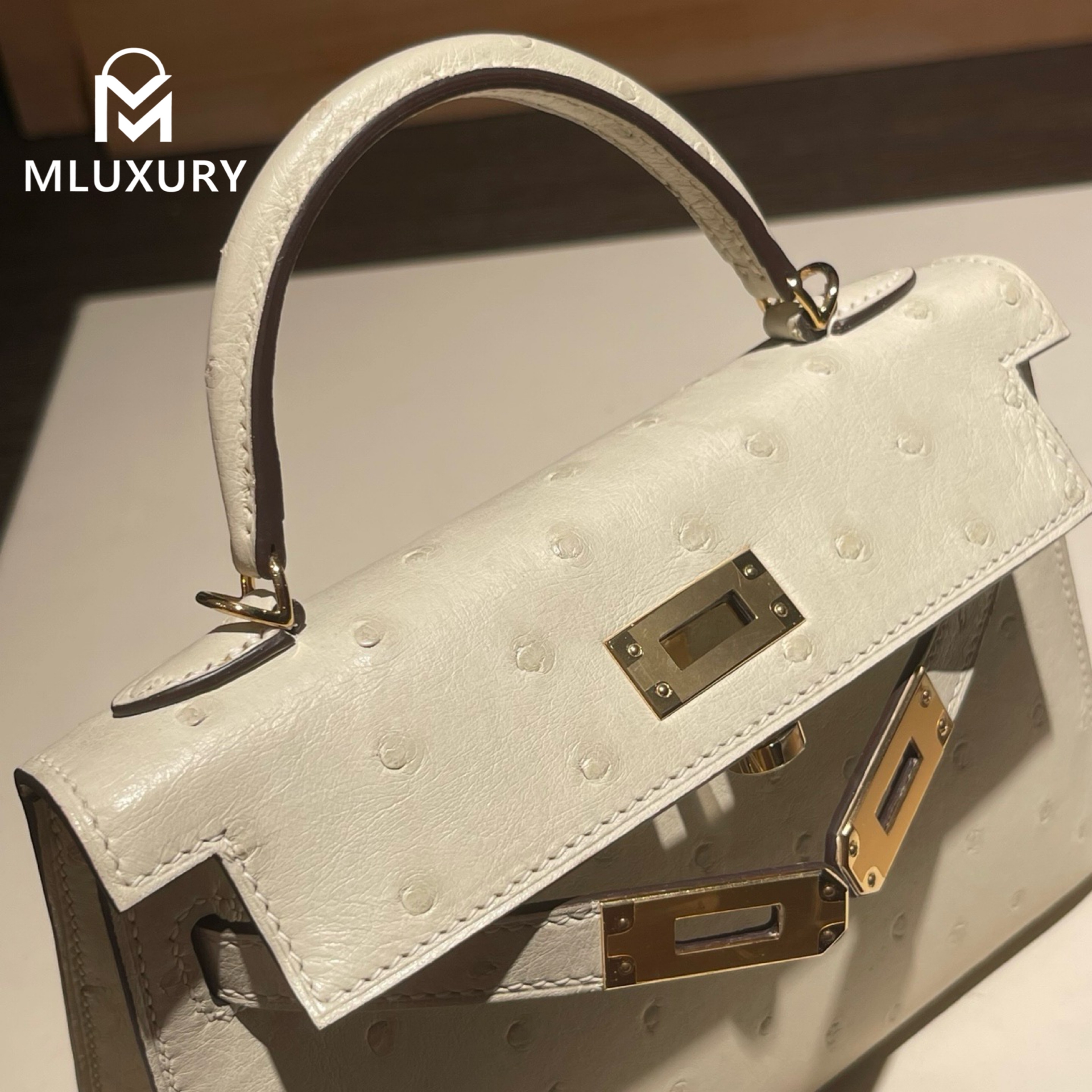 Hermès Mini Kelly II, Ostrich leather, Wool white, Gold hardware