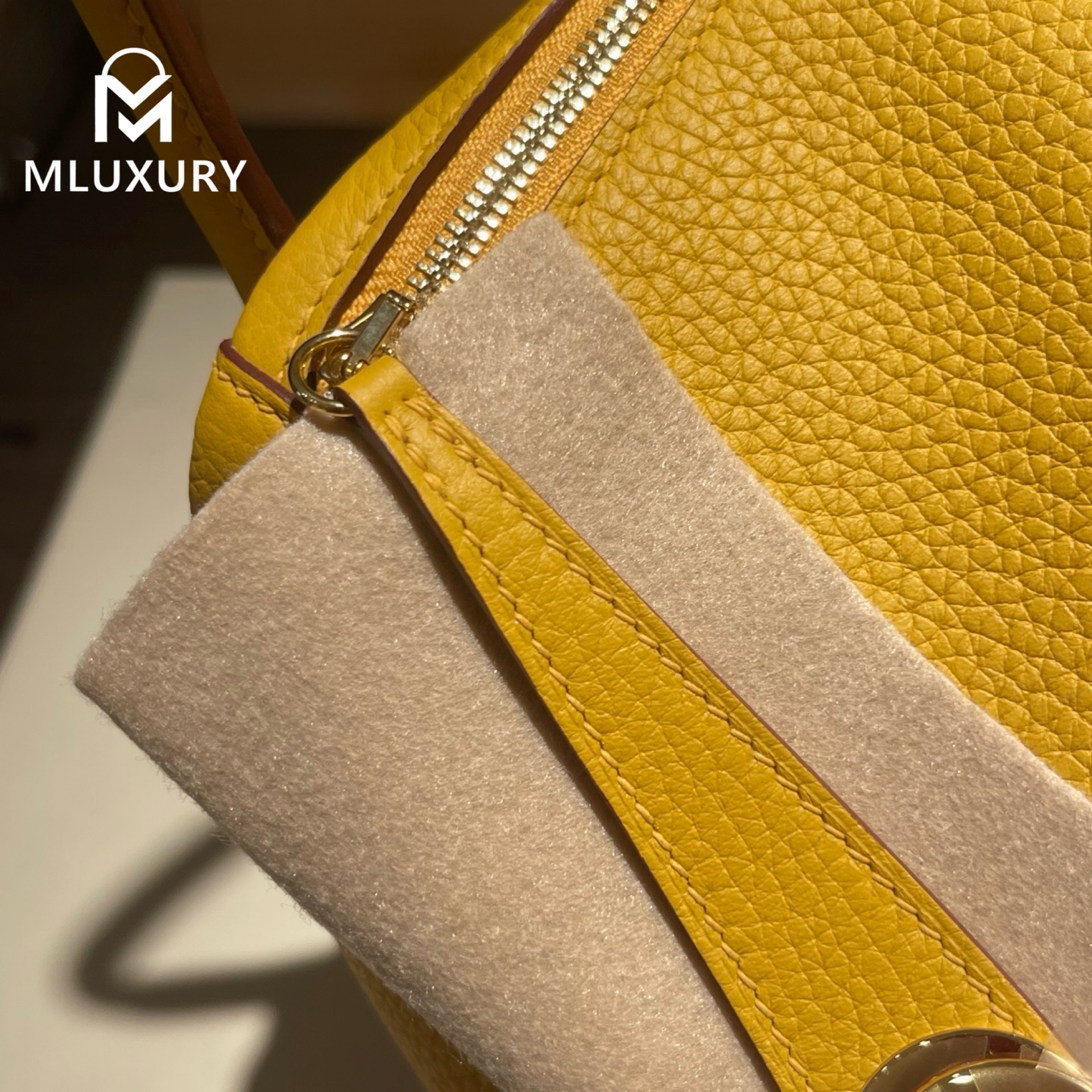 Hermès Lindy 26, made in France with Remy Carriat TC leather, 9D amber yellow, gold hardware