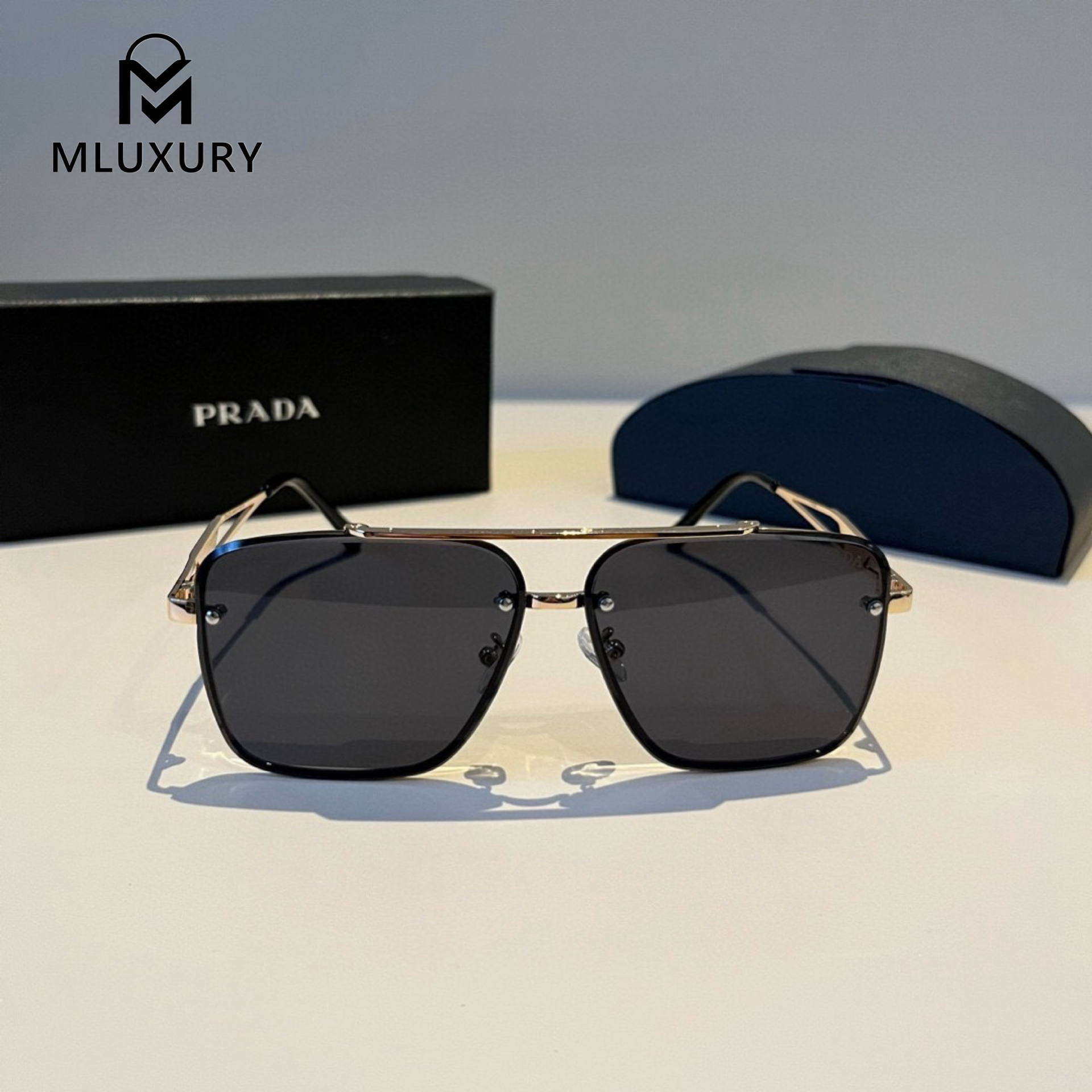PRADA SUNGLASSES