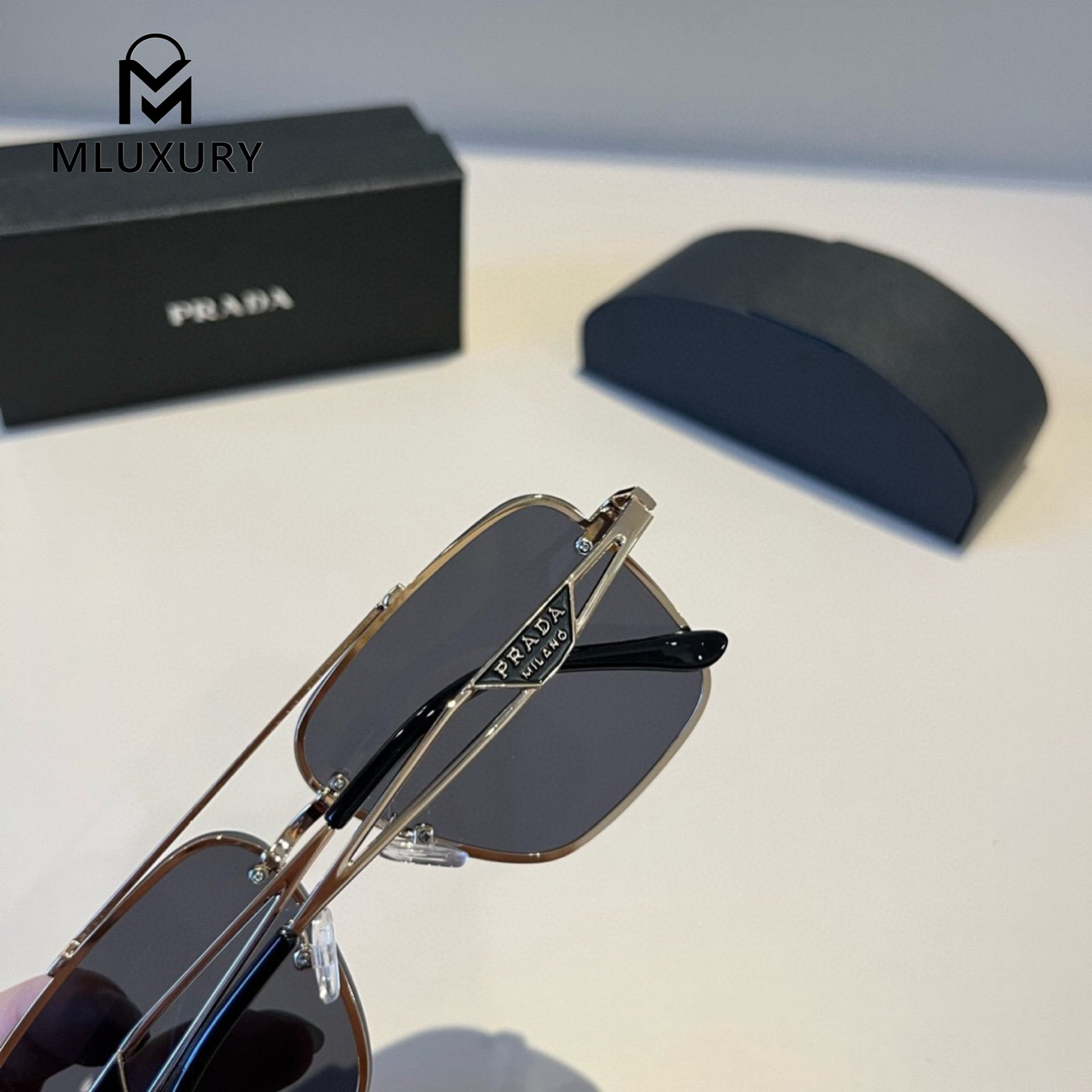 PRADA SUNGLASSES