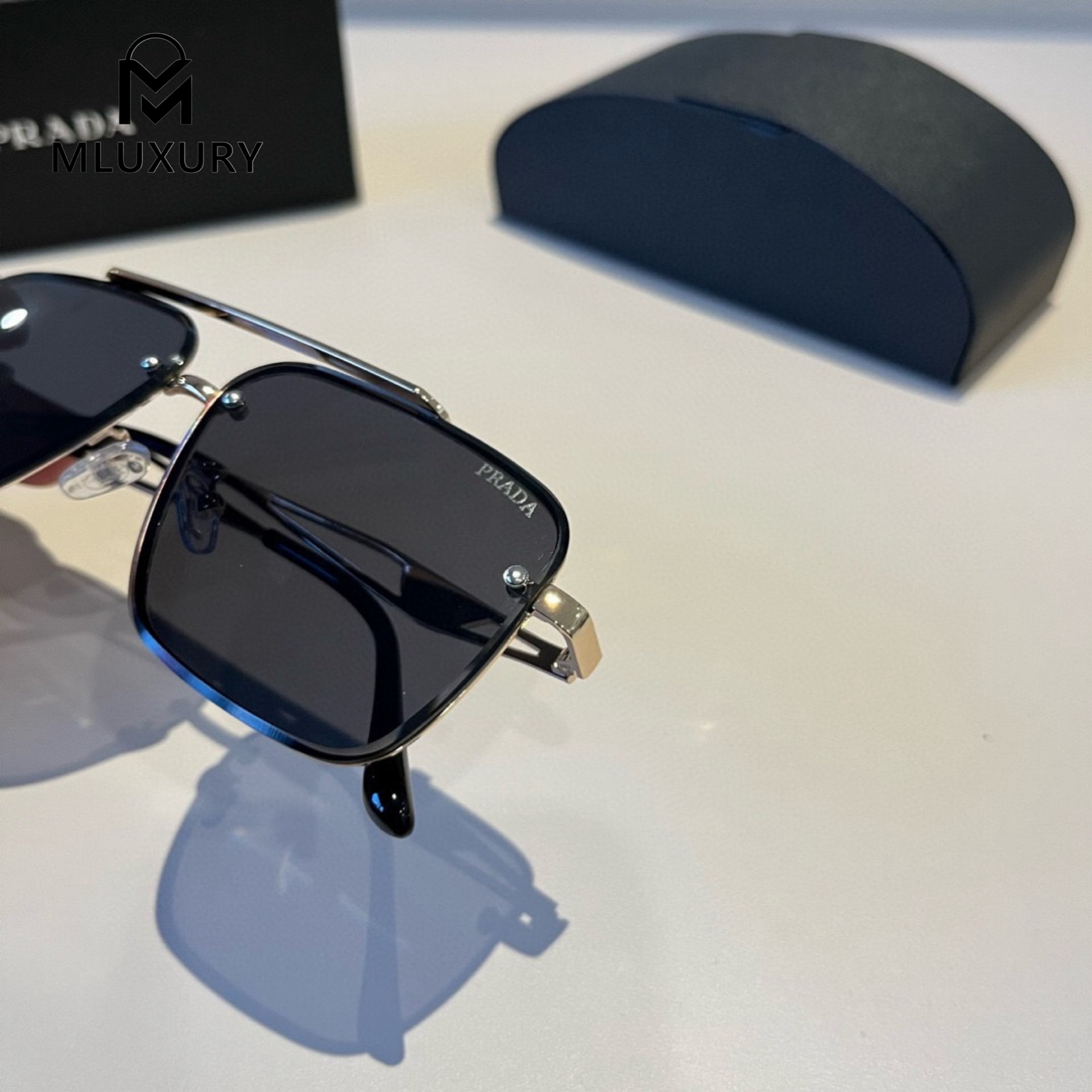 PRADA SUNGLASSES