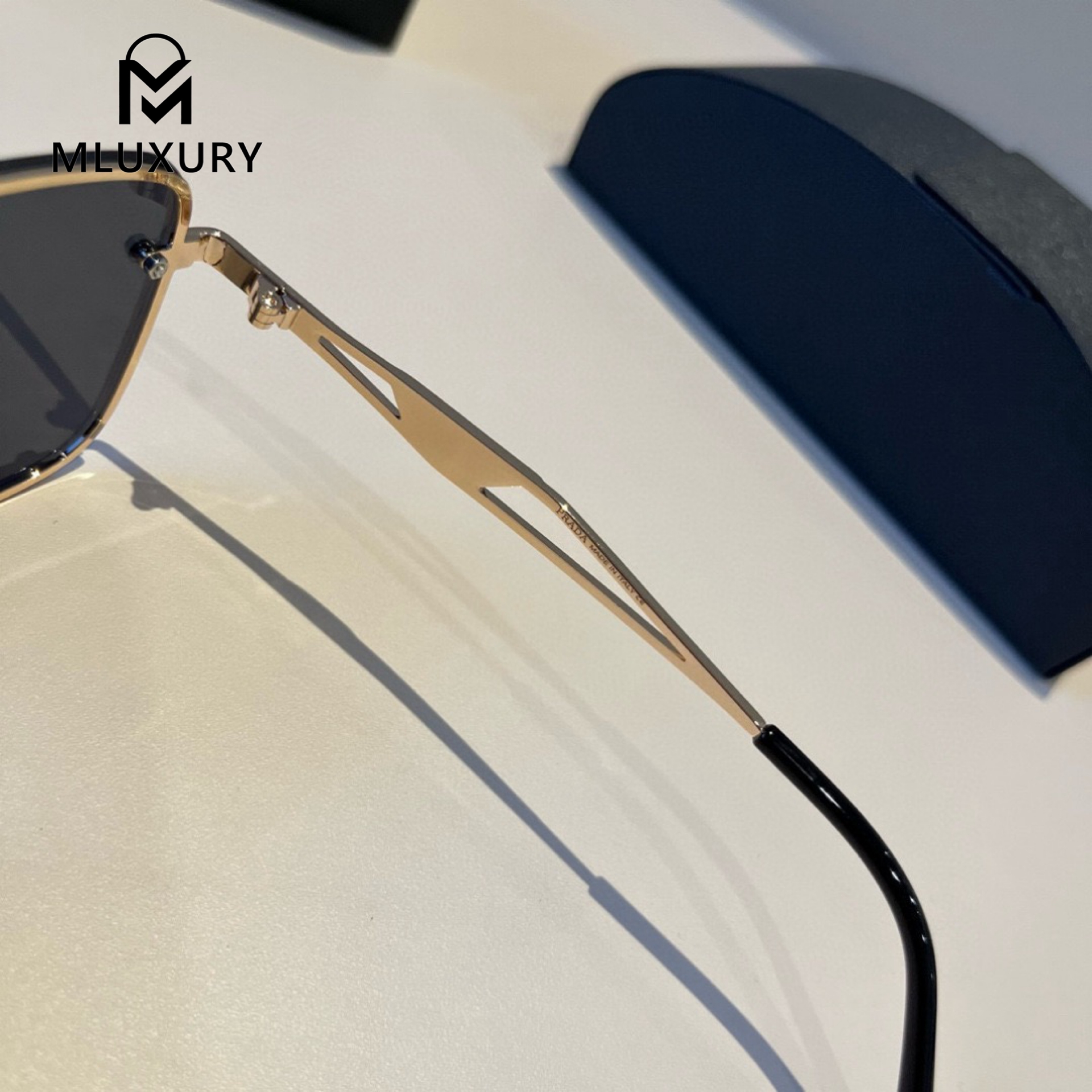 PRADA SUNGLASSES