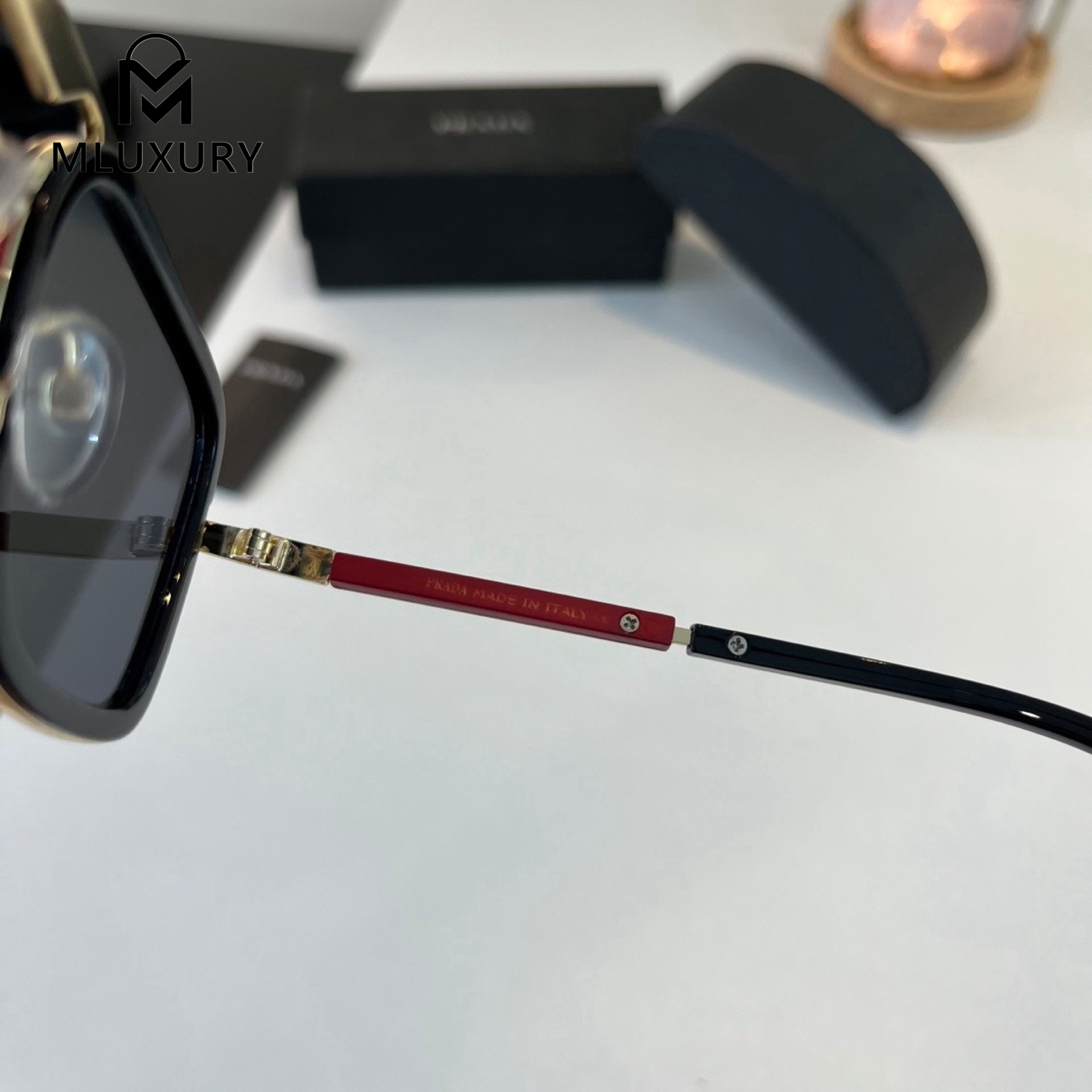 PRADA SUNGLASSES