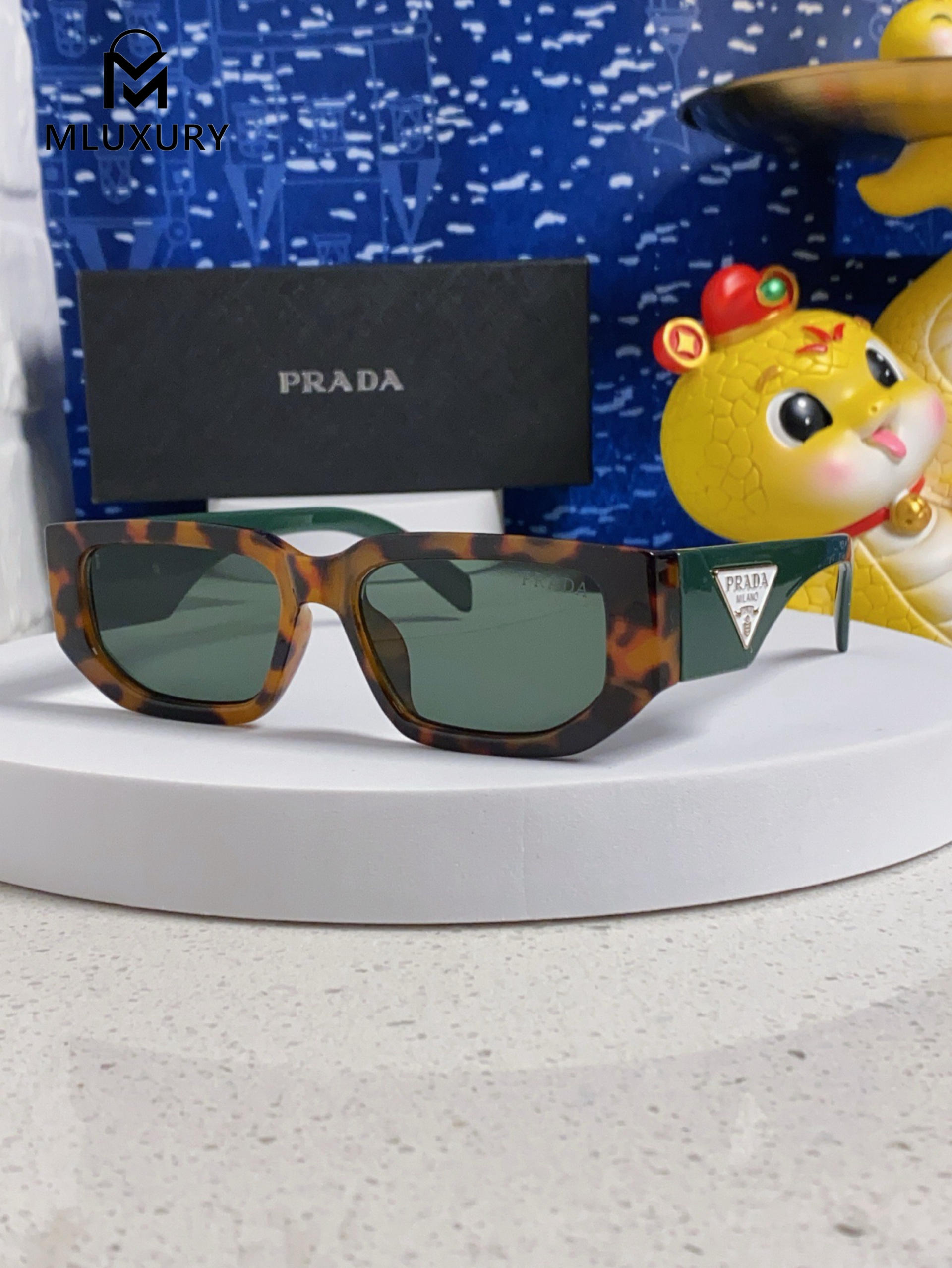 PRADA SUNGLASSES
