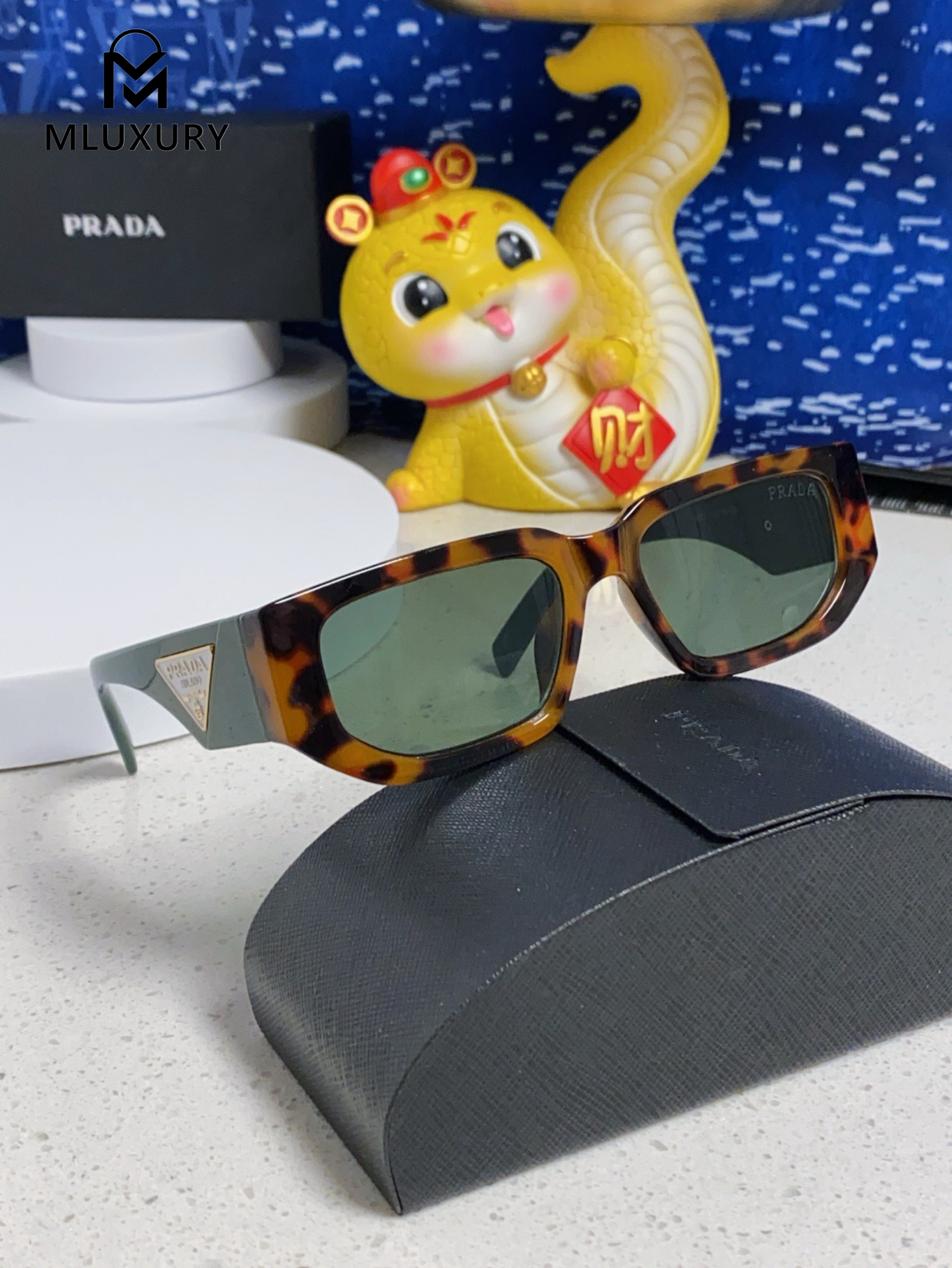PRADA SUNGLASSES